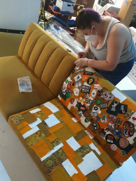 Me installing fabric patchwork