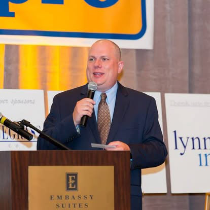 Me serving as Emcee at a Lexington Rescue Mission Banquet. I think I did this for 10 years. 