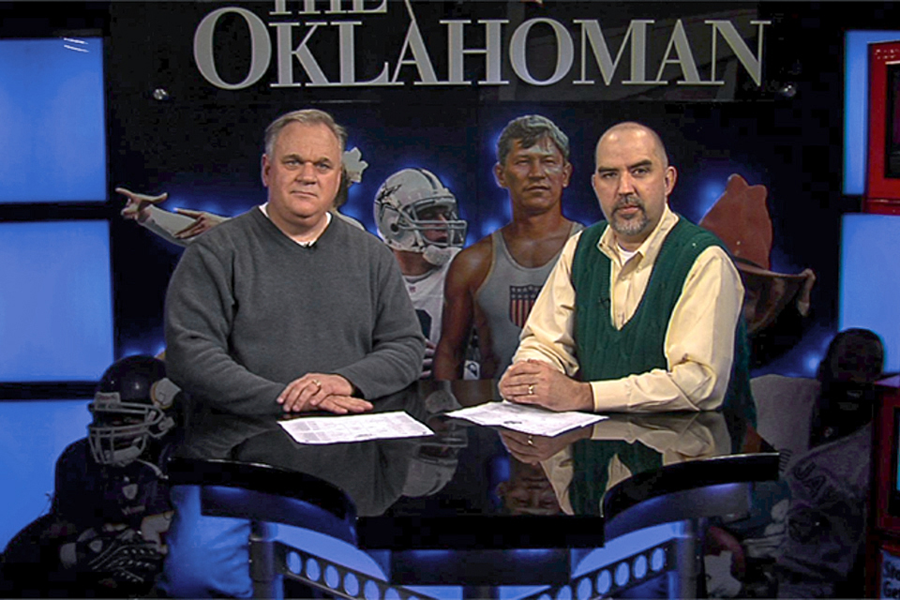 Sports writers, John Rohde and Mike Sherman.