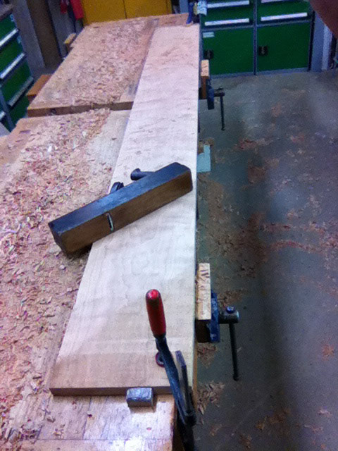 Planing the cherry wood planks