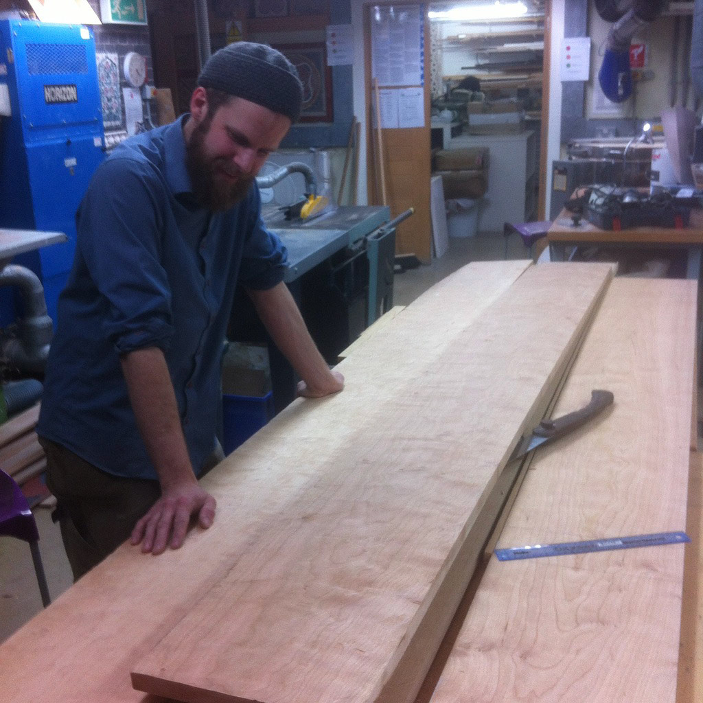 Planing the cherry wood planks