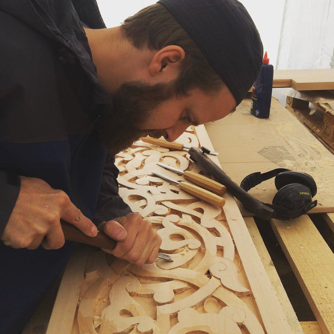 Carving the pattern with chisels, gouges and mallet