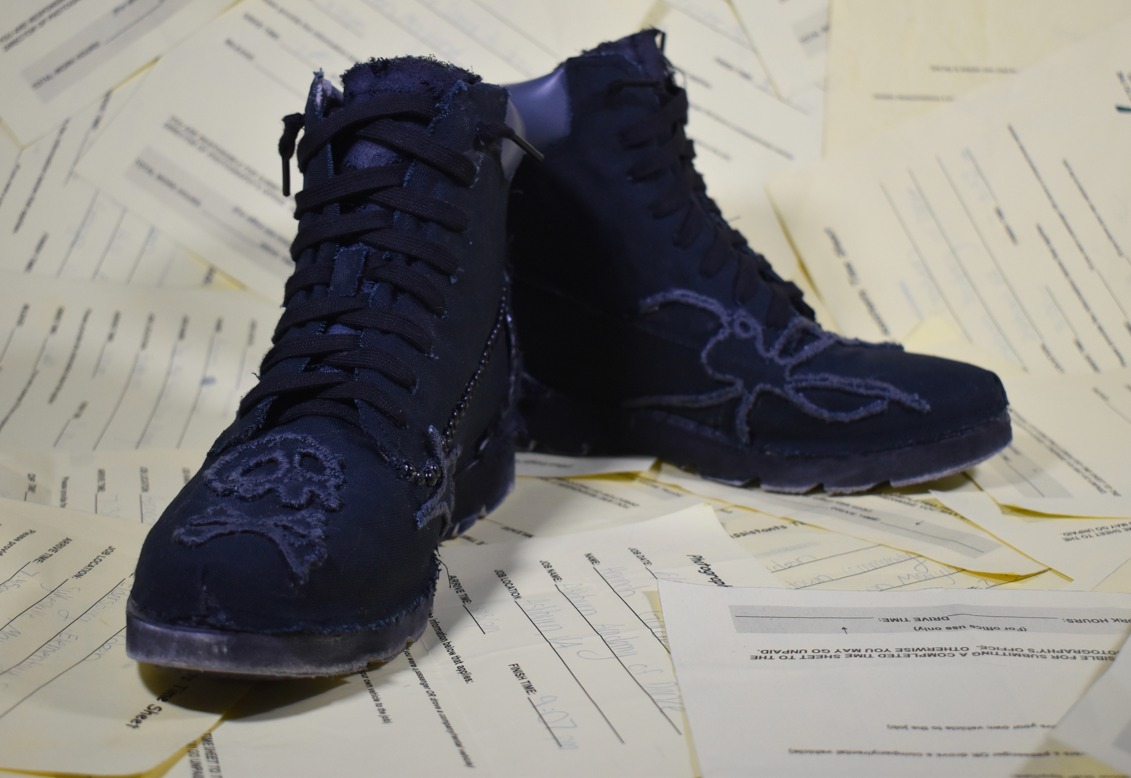 WORK, 2023, thrifted fabric, shoes, thread, glue, timesheets from work, Ellicott city MD