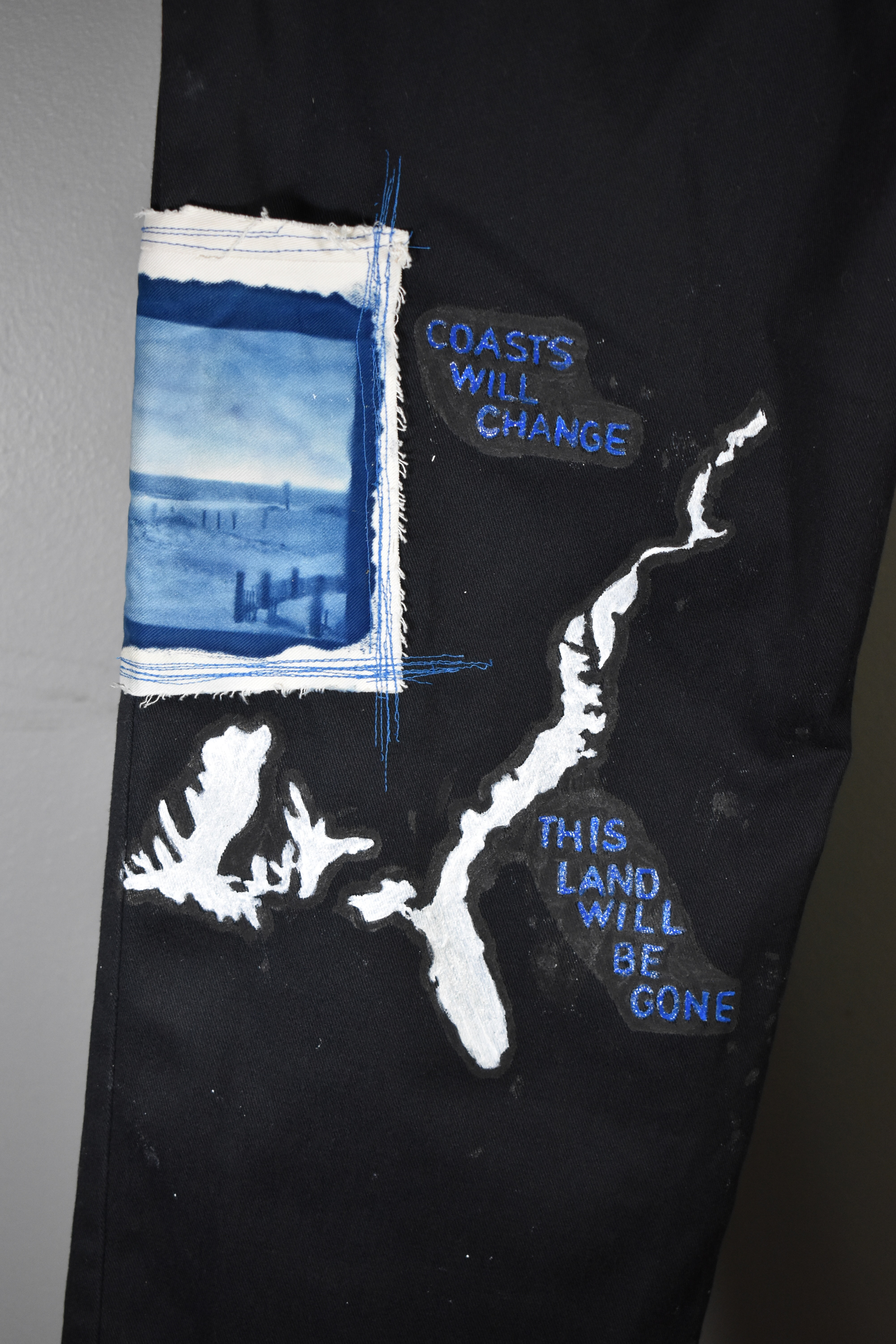 Close-up of Global Warming Pants, 2022, pants, fabric paint, cyanotypes, Senior Exhibition (Express Your Thoughts On...)