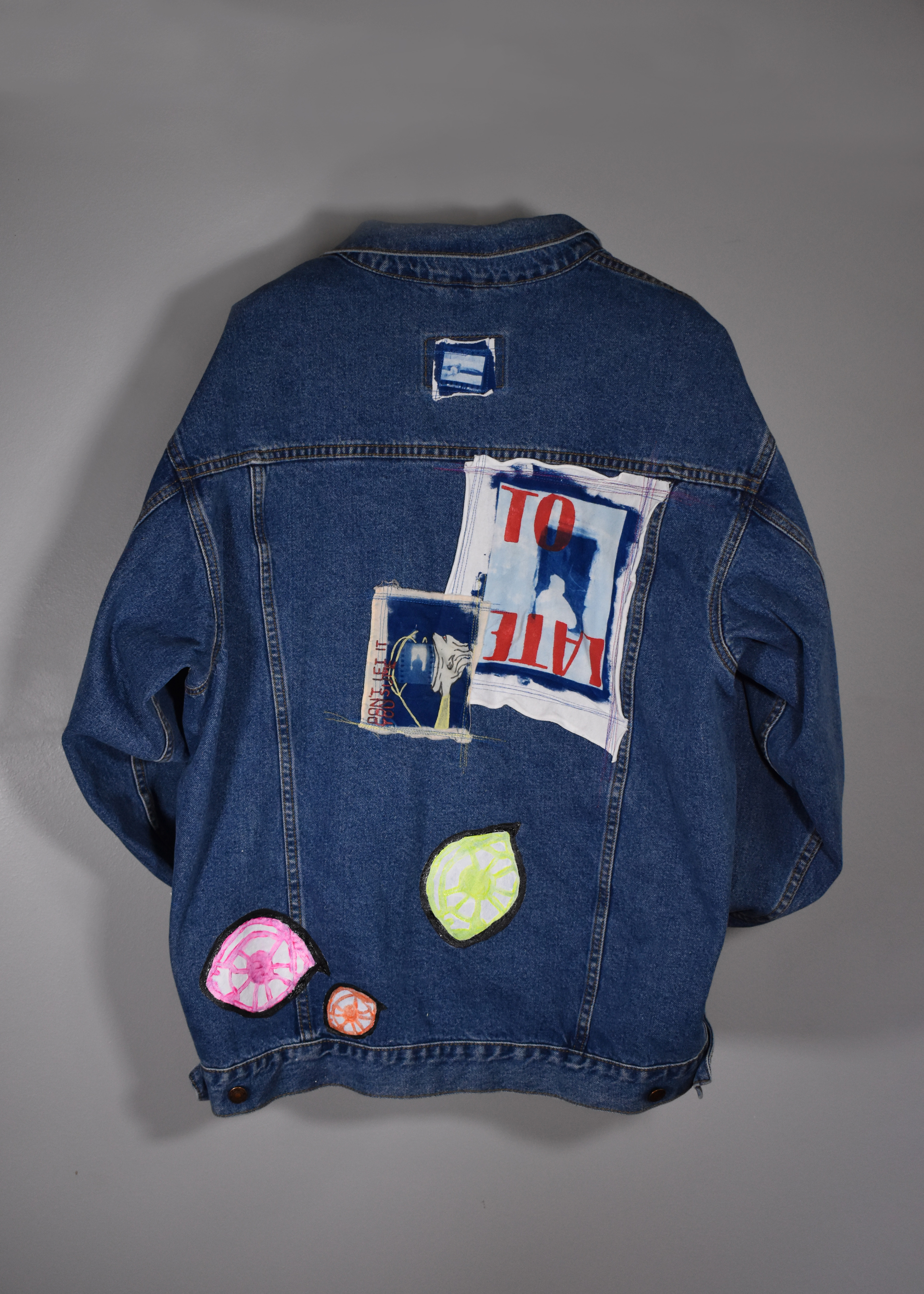 Don't Let it Consume You, 2022, Jean jacket, fabric paint, cyanotypes, Salisbury University