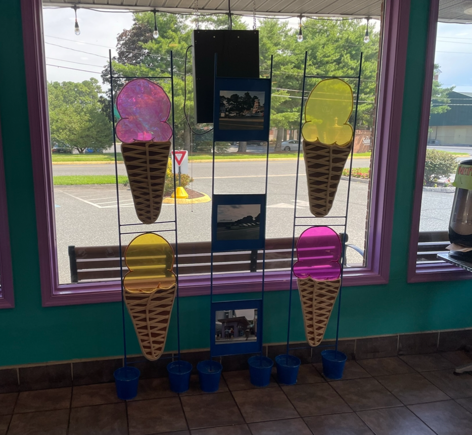 Island Creamery Sculpture Gift, 2021, Film Photographs, yarn, steel welded peices, concrete, buckets, colorful clear wrap, glue, Salisbury University MD