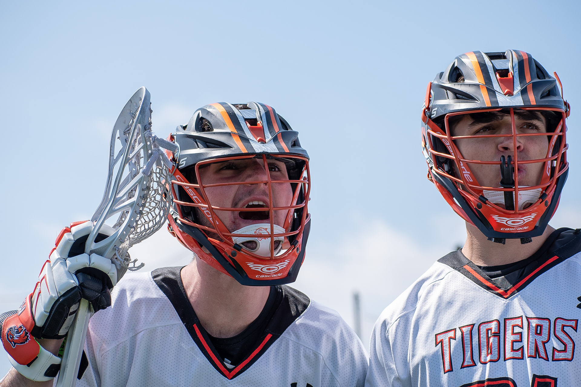 Freshman Zac Gagnon and Conor Bollin of RIT  celebrate on the sidelines after a goal during a game against RPI on April 6th, 2019 at the RIT Turf Field in Henrietta NY. RIT Won 22-13