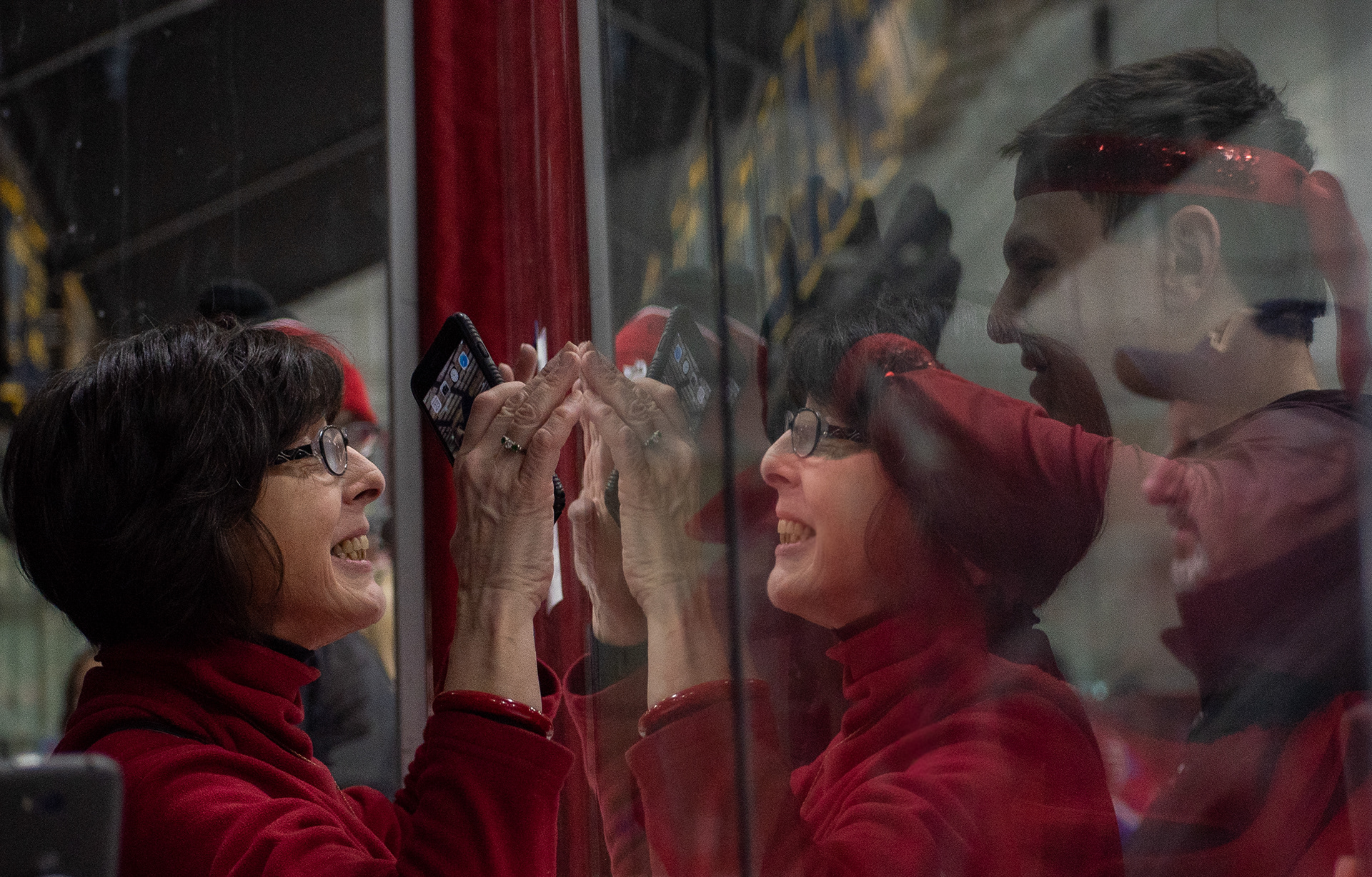 Karla Peterson greats her son Johnathan at the glass during warms ups, at the Special Olympics NY,  on February 24th, 2019,  at the Genesee Valley Sports Complex in Rochester New York. Peterson took home gold in his division. 