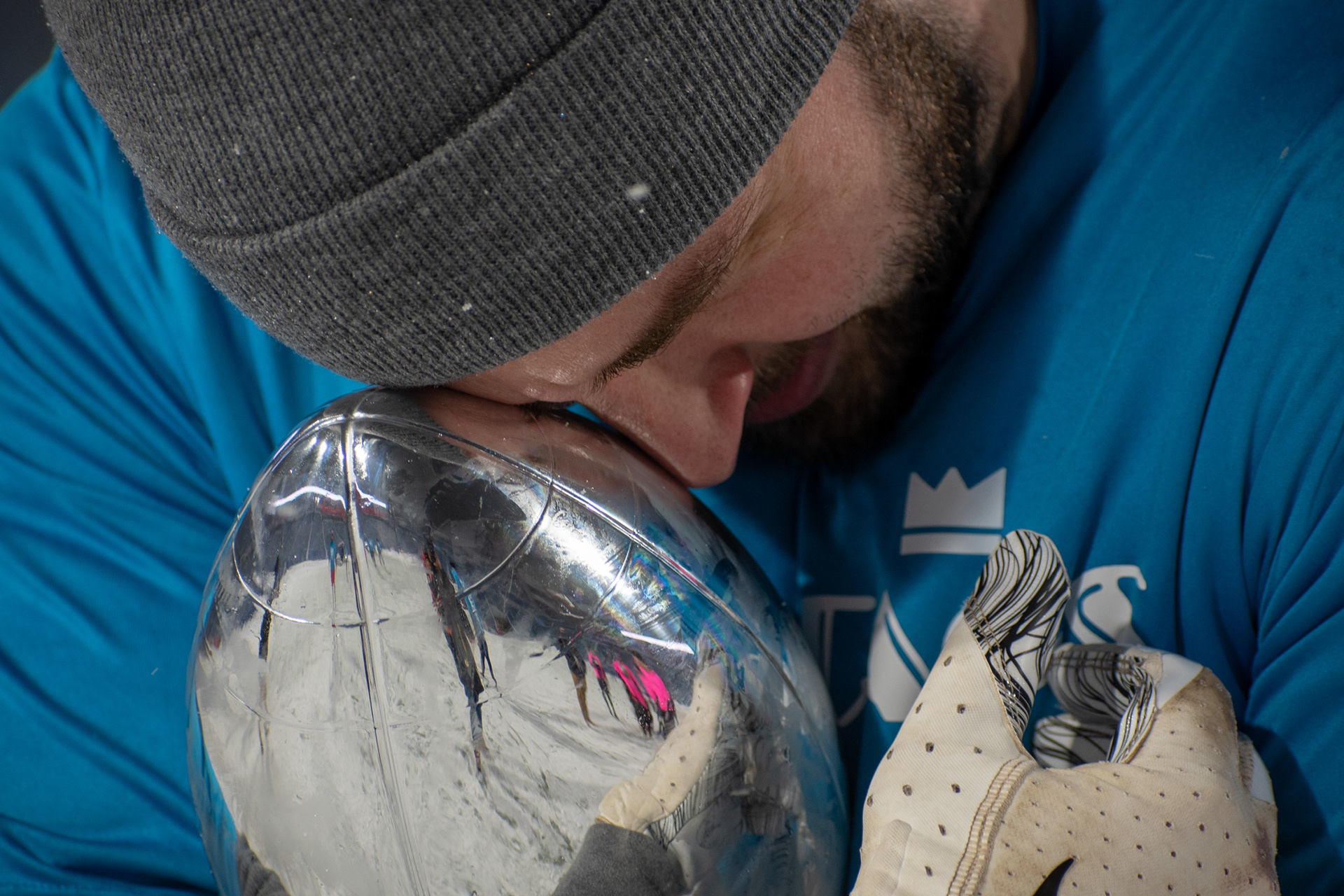 Bryan Gilbert, captain of “The Elites” hugs the trophy after his team wins the The Snow Bowl in benifit of Special Olympics on March 2nd, 2019,  at New Era Field in Orchard Park New York. 