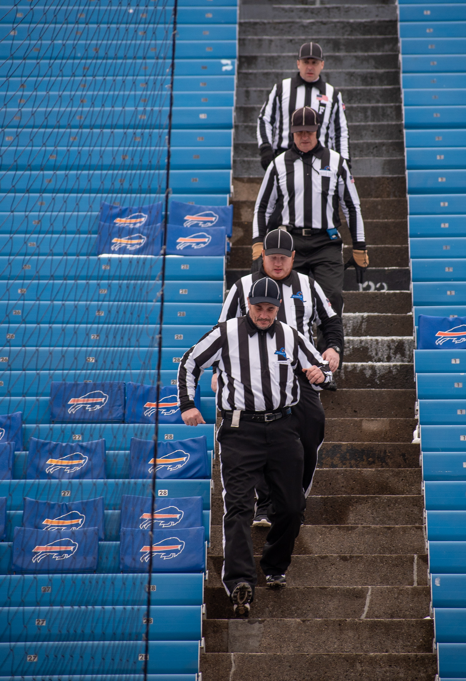 Referees make their way down to the field for opening ceremonies for The Buffalo Snow Bowl, in benefit of Special Olympics, on March 2nd, 2019,  at New Era Field in Orchard Park New York.  