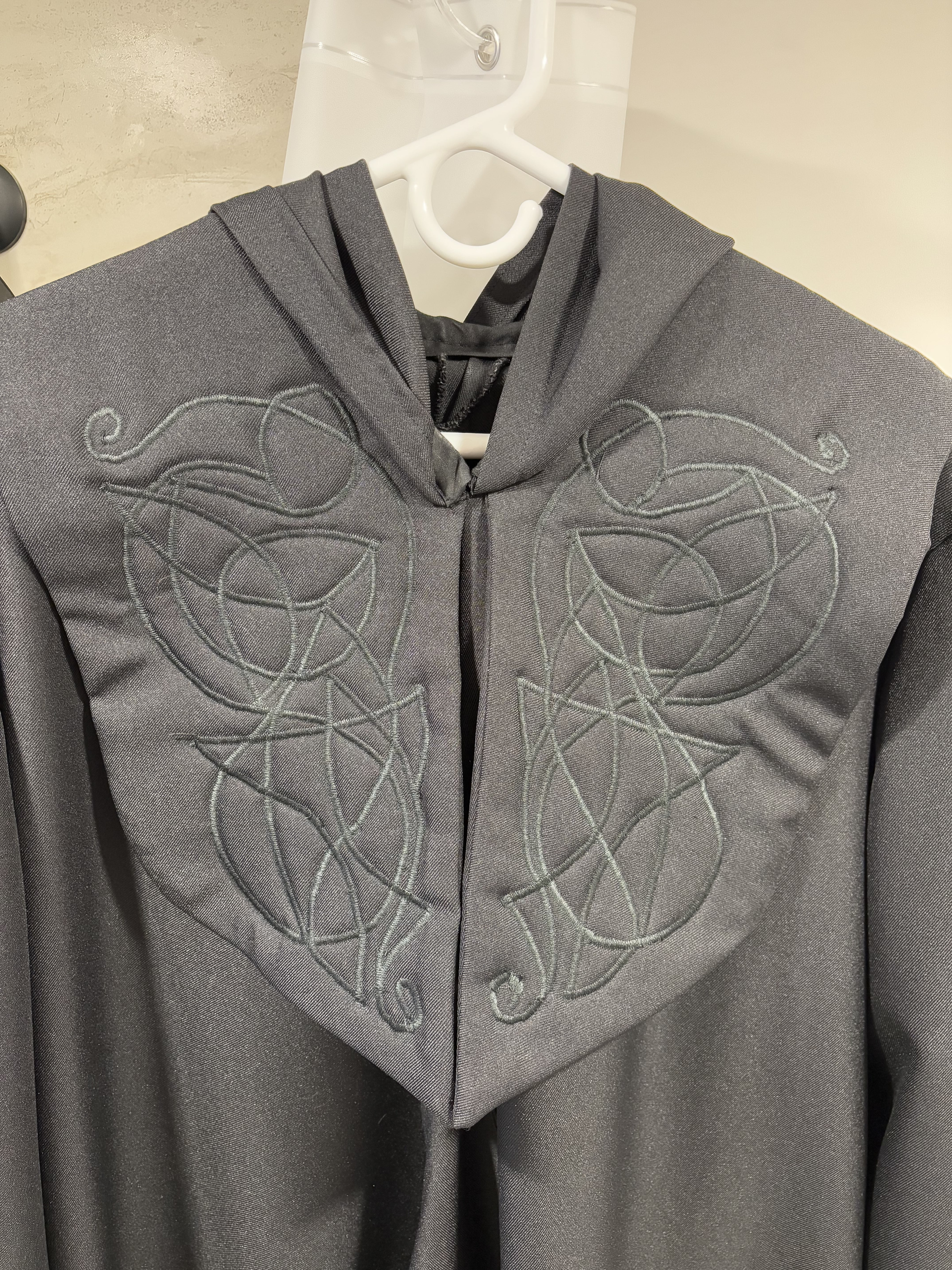 Freehand embroidered patterns on hand patterned robes.  2 of 12.  2023-25