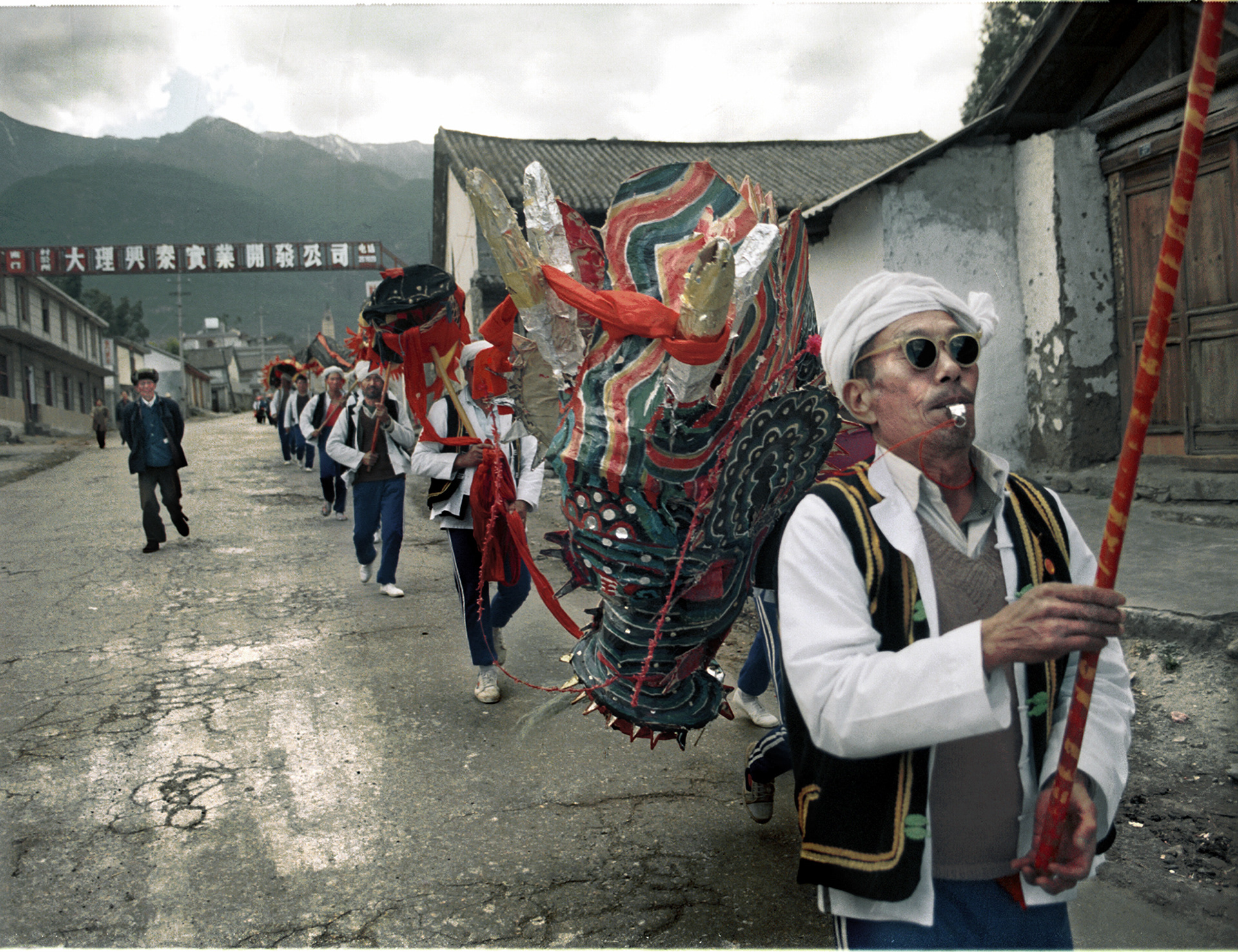 Ethnic Bai perform a dragon dance, Dali, Yunnan, China