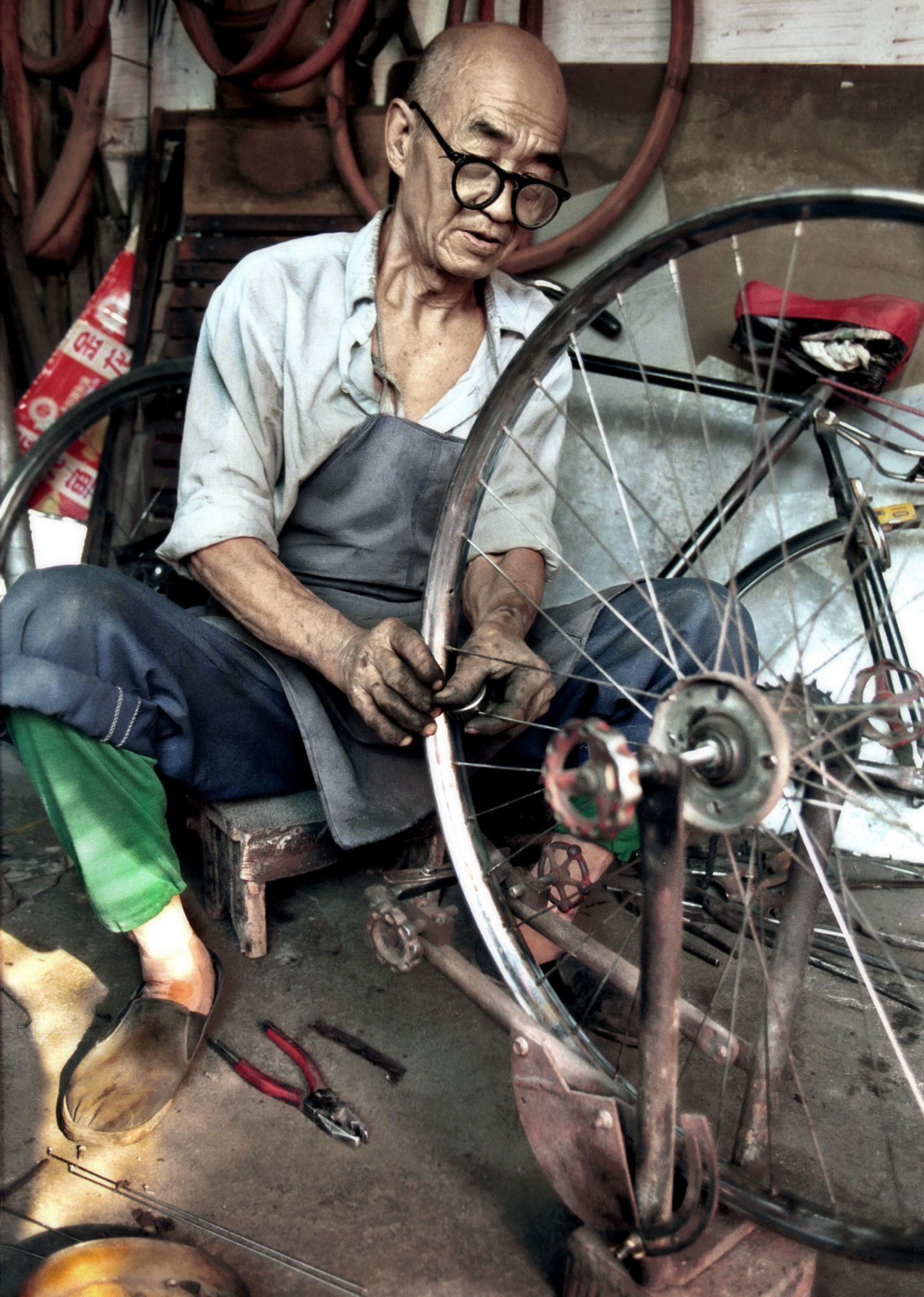 Bike repair, Dongbiaobei Hutong, Beijing, China