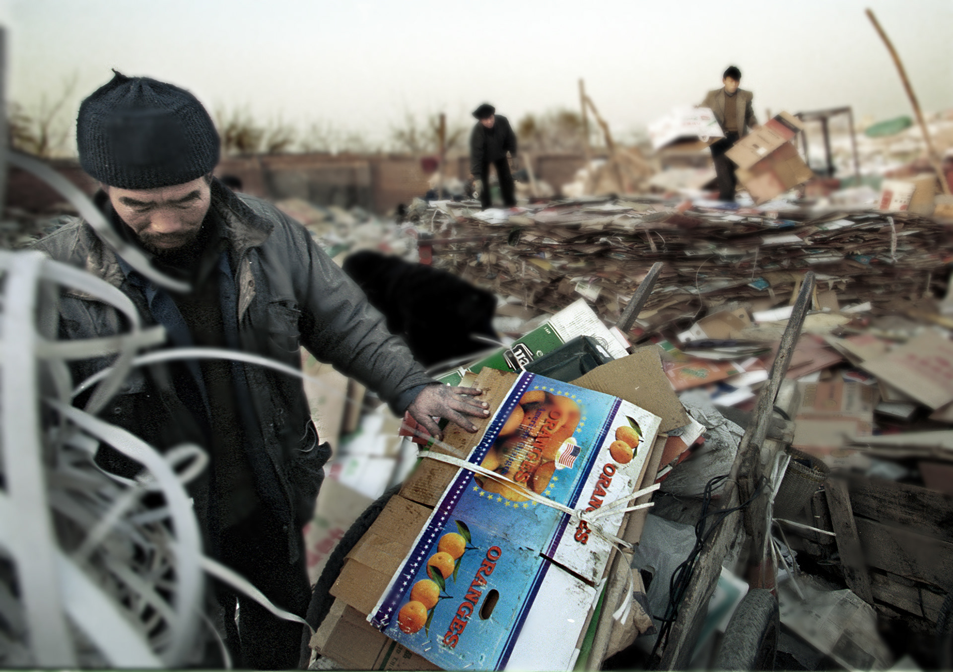 Migrant recycler selling cardboard, Beijing China