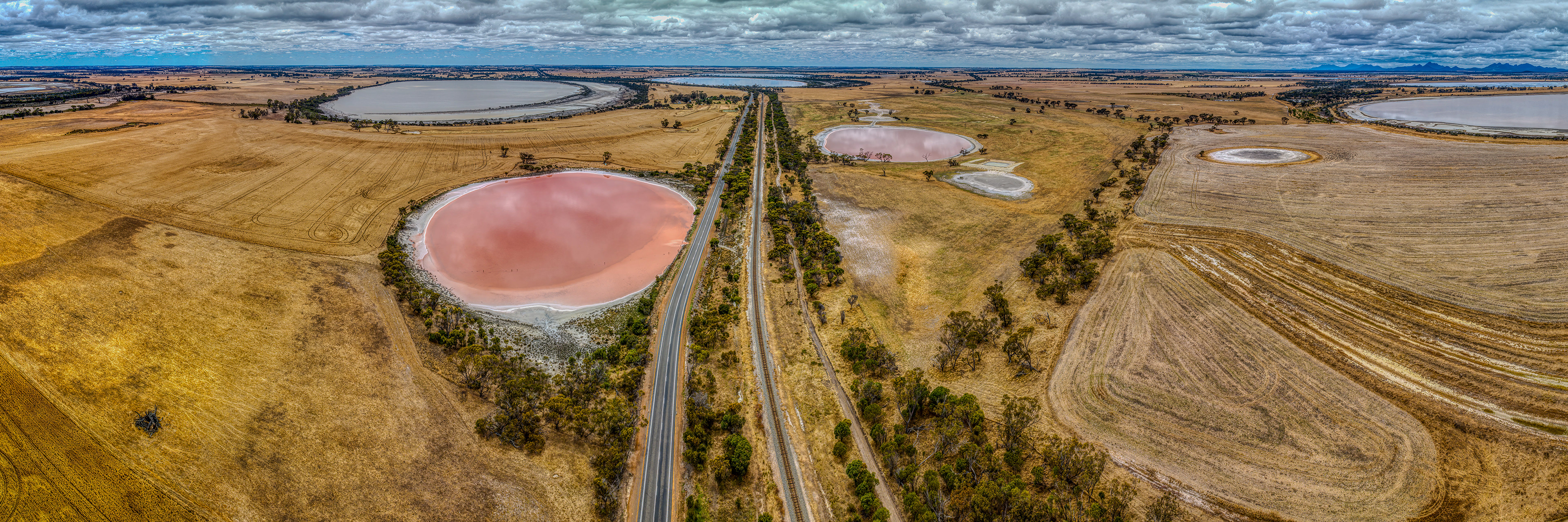 Drone panorama of pink salt lakes in the wheatbelt town of Cranbrook, Western Australia