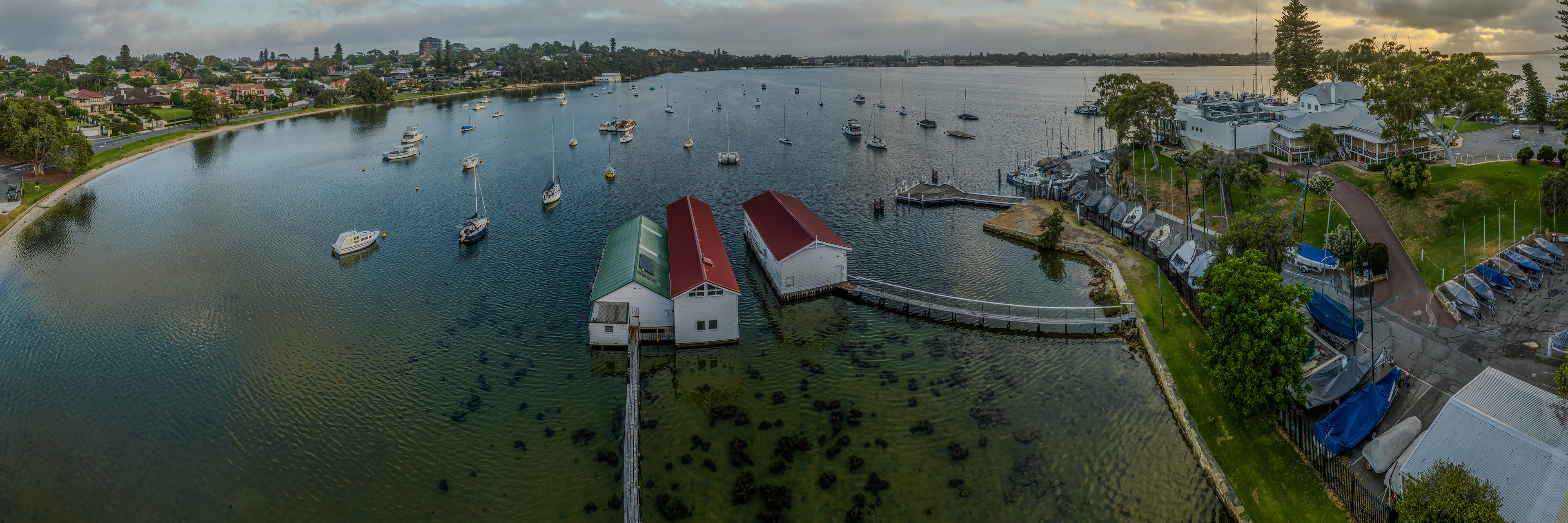 Drone panoramic HDR image of the wooden boat sheds at Freshwater Bay, Peppermint Grove, Western Australia.