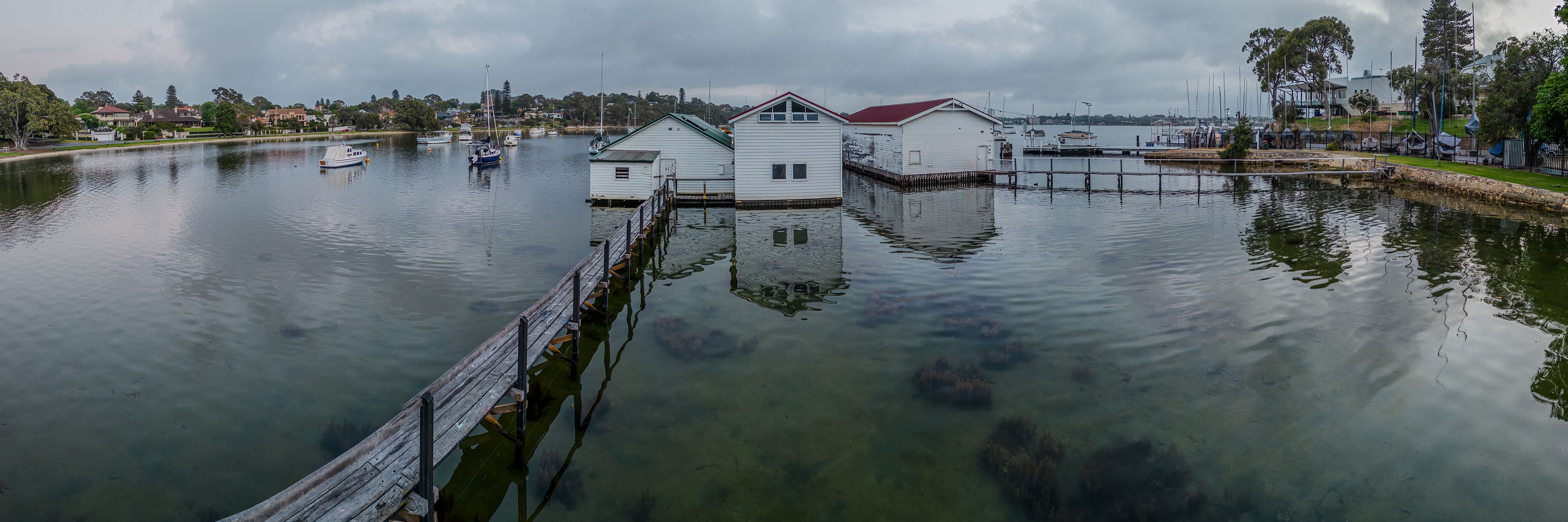 Drone panoramic HDR image of the wooden boat sheds at Freshwater Bay, Peppermint Grove, Western Australia.