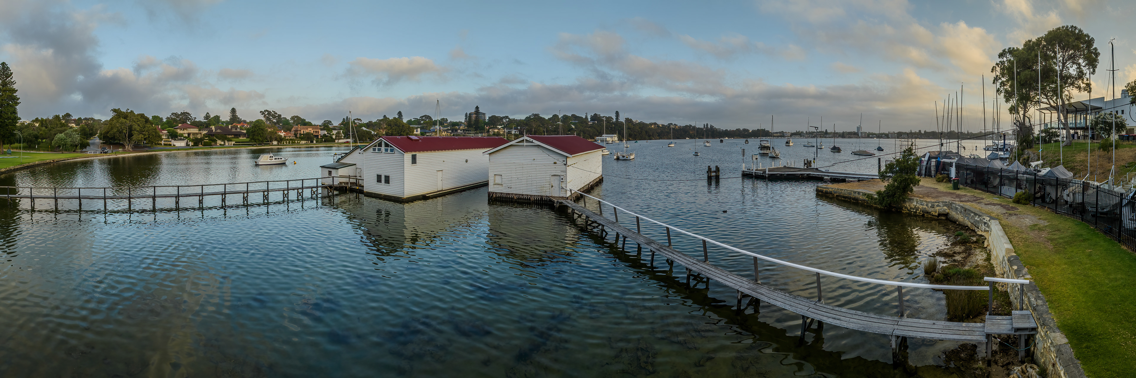 Drone panoramic HDR image of the wooden boat sheds at Freshwater Bay, Peppermint Grove, Western Australia.