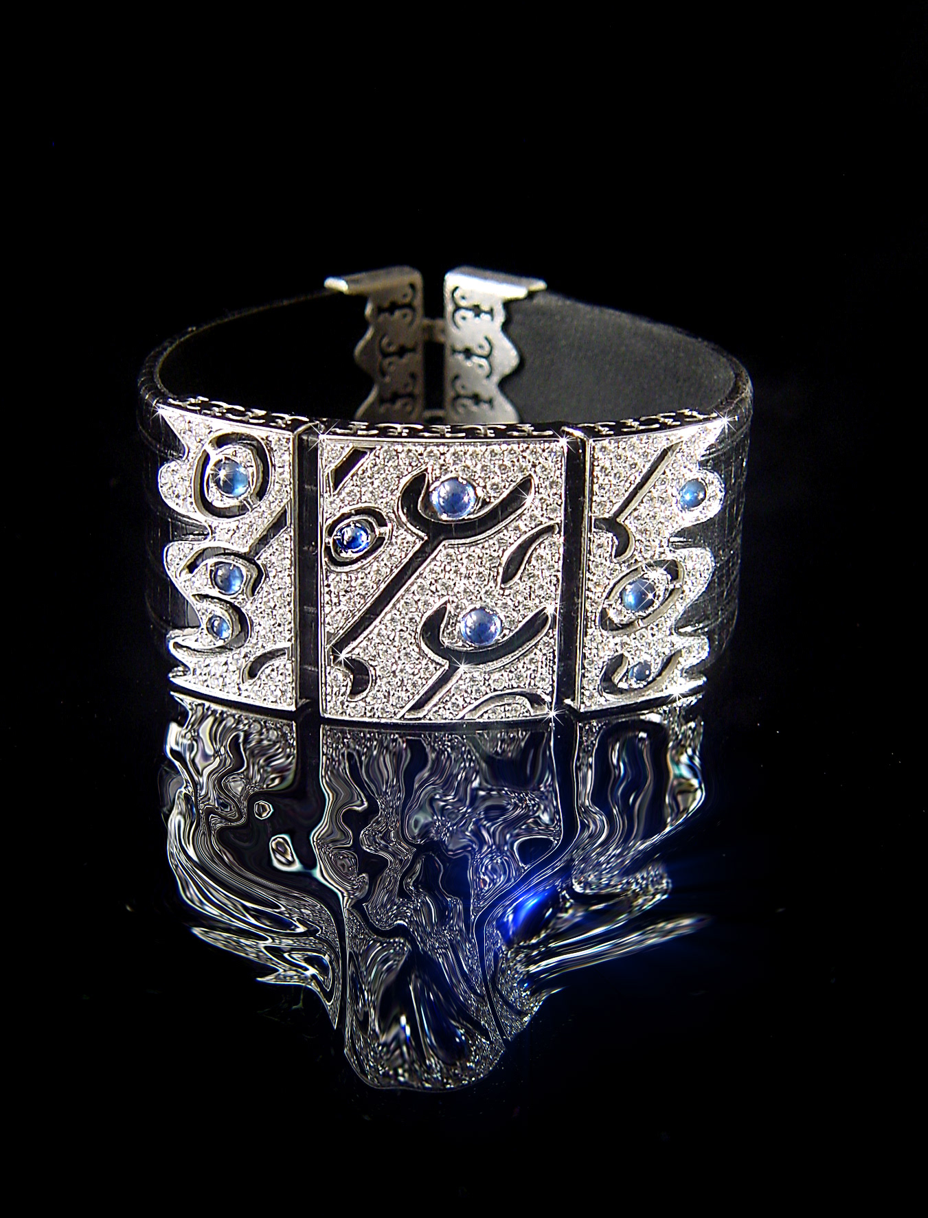 Bracciale in oro 18 kt con Zaffiri cabochion e Diamanti 