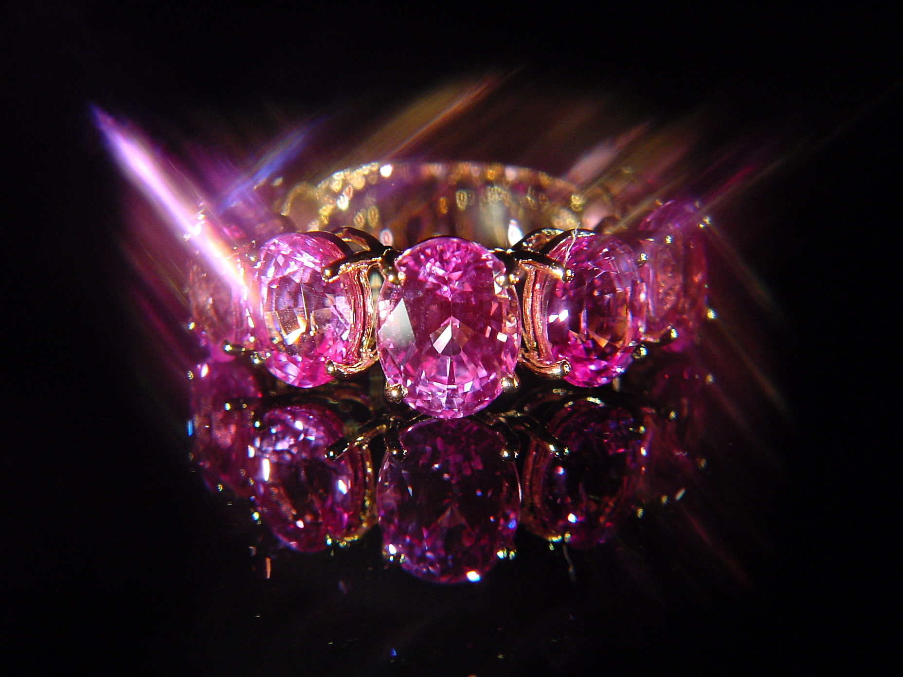 Riviere in oro 18 kt con Zaffiri rosa