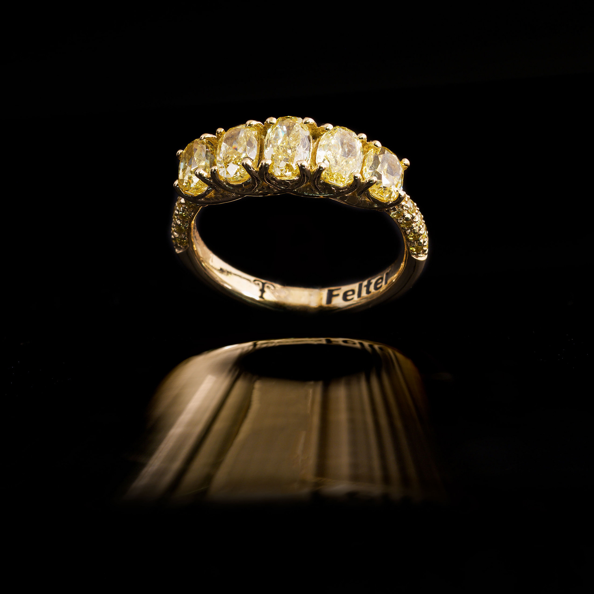 Riviere in oro 18 kt con diamanti Fancy Yellow