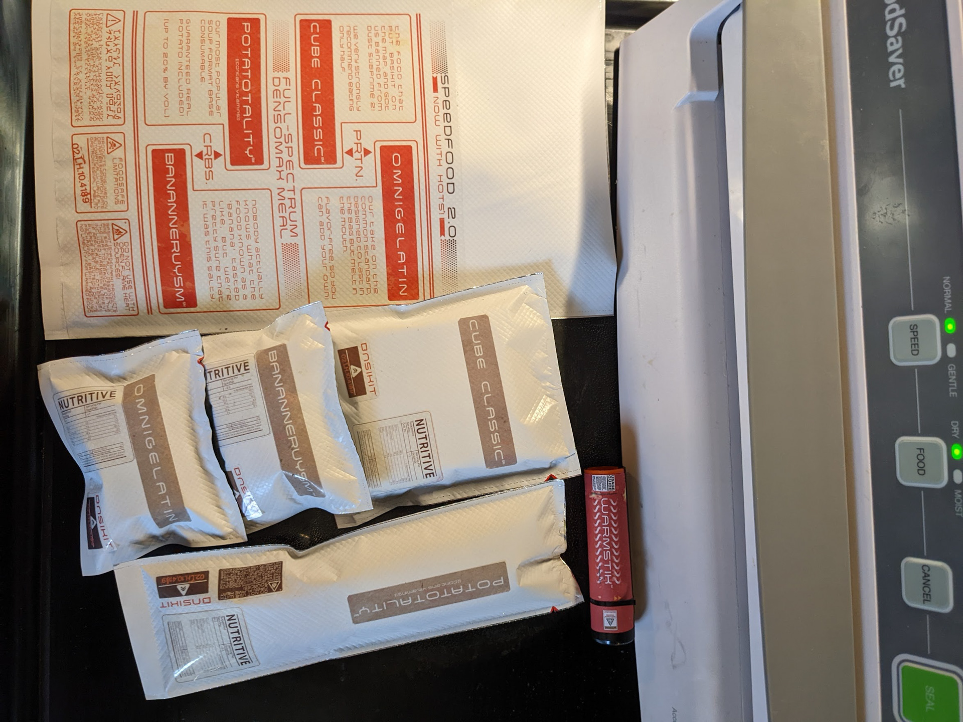 SpaceFood (custom graphic design, vacuum-saver packaging - genuinely edible prop!)