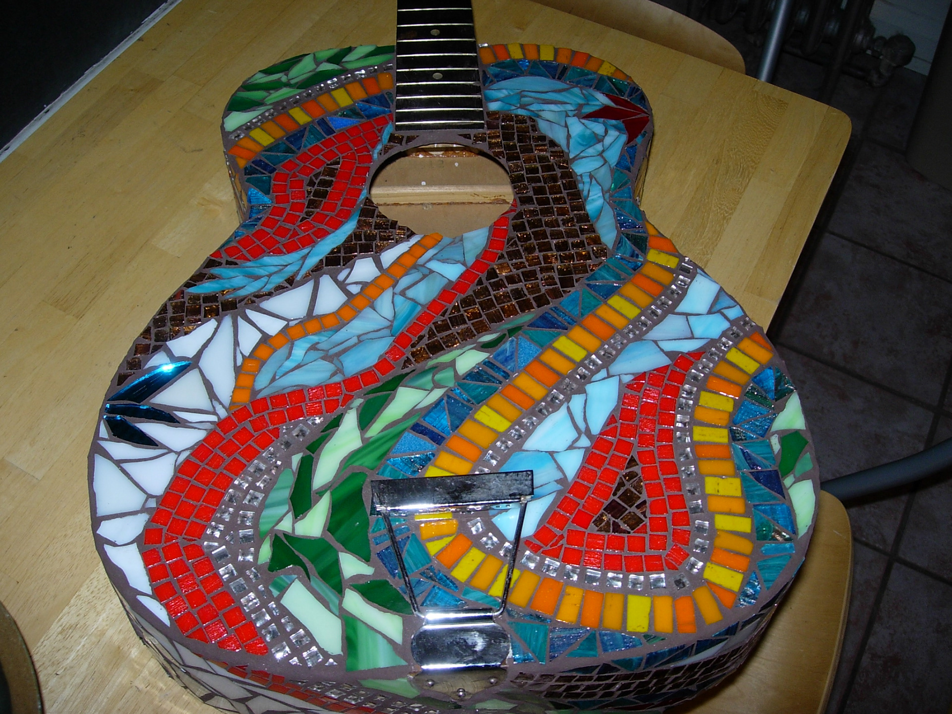 I create mosaic guitars and ukeleles.