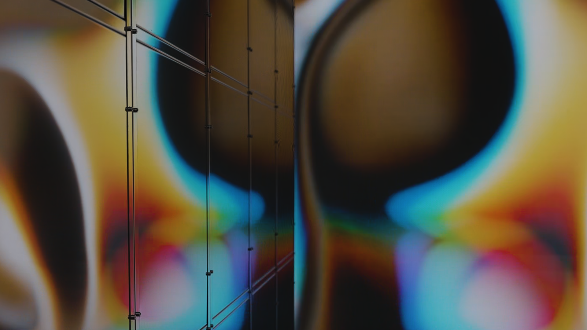 Photo showing the reflection of the LED screen video on the mirror furniture piece by NM3 in the installation 'JUST ADD WATER'