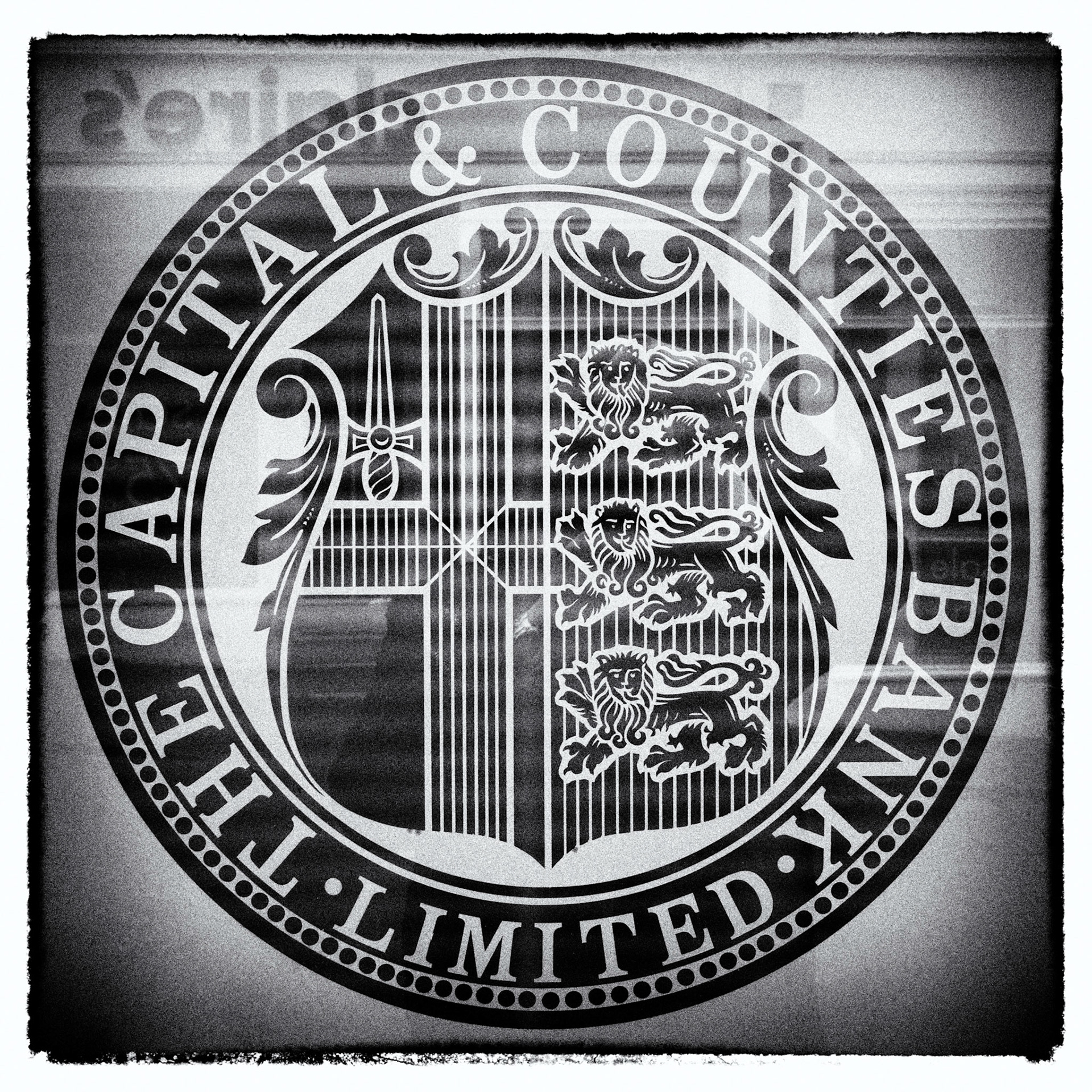 When I walk down the High Street I occasionally think about how it has changed since I was a youn boy.There are still a few old familiers: The Post Office, Newsagaents, Baker, others less so.I was reminded of this today as I was walking past a Lloyds Bank branch on Guernsey, when I noticed the glass in the windows.