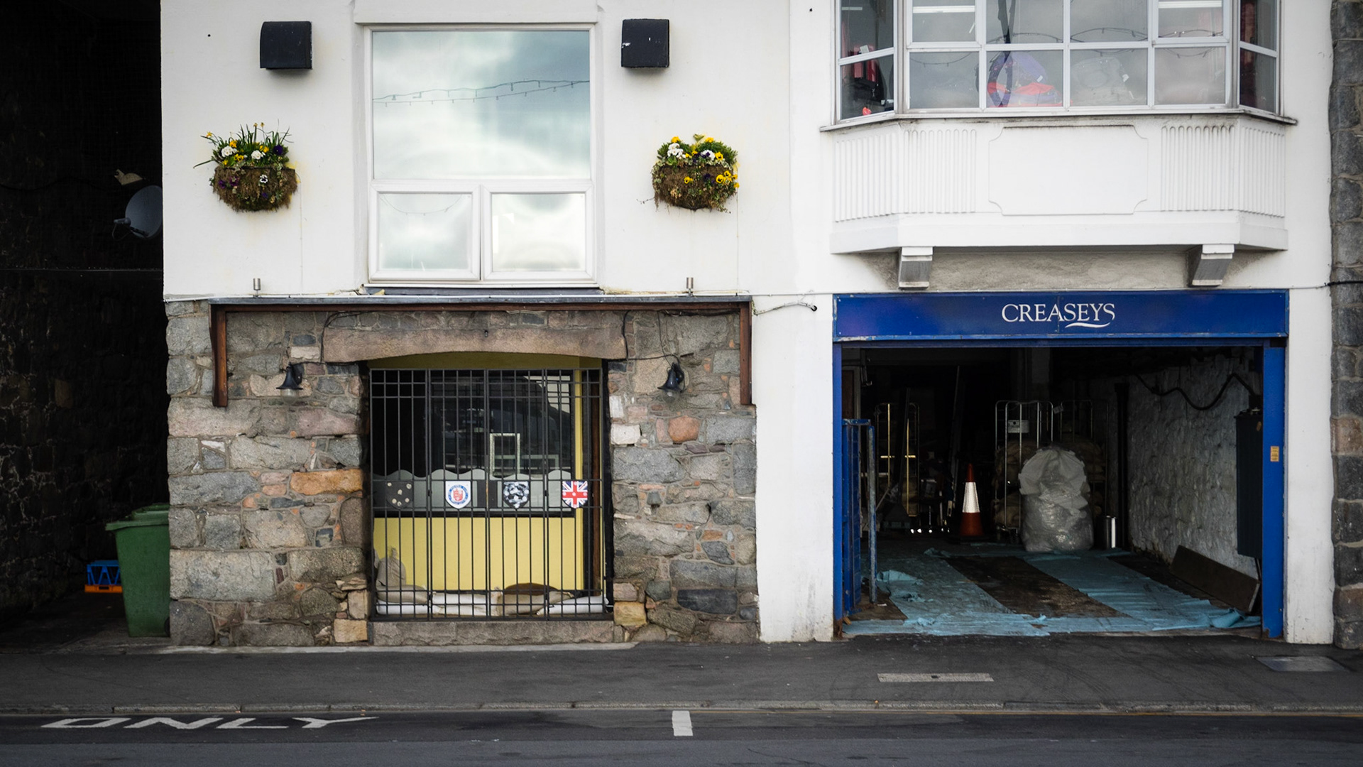 Guernsey has been a little battered in recent months by the weather.In some places there are still sand bags out.