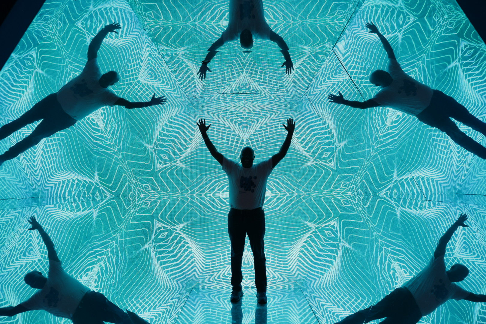 Museum of Illusion St. Louis general manager Steve Garmon poses for a photo inside a walk in kaleidoscope with an electronic screen in the City Foundry STL in St. Louis, Mo. on Tuesday, May 21, 2024. The museum holds multiple kaleidoscope exhibits of various sizes and different photo opportunities. (Dominic Di Palermo/St. Louis Post-Dispatch) 