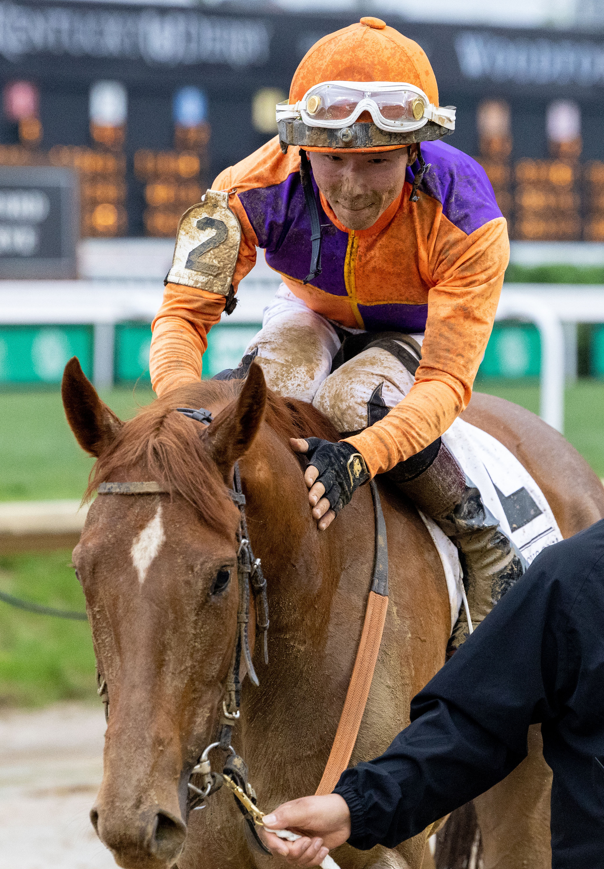 Jockey Kazushi Kimura congratulates Kopion the horse after they won the 39th running of The Derby City Distaff at Churchill Downs in Louisville, Ky. on Saturday, May 3, 2025.