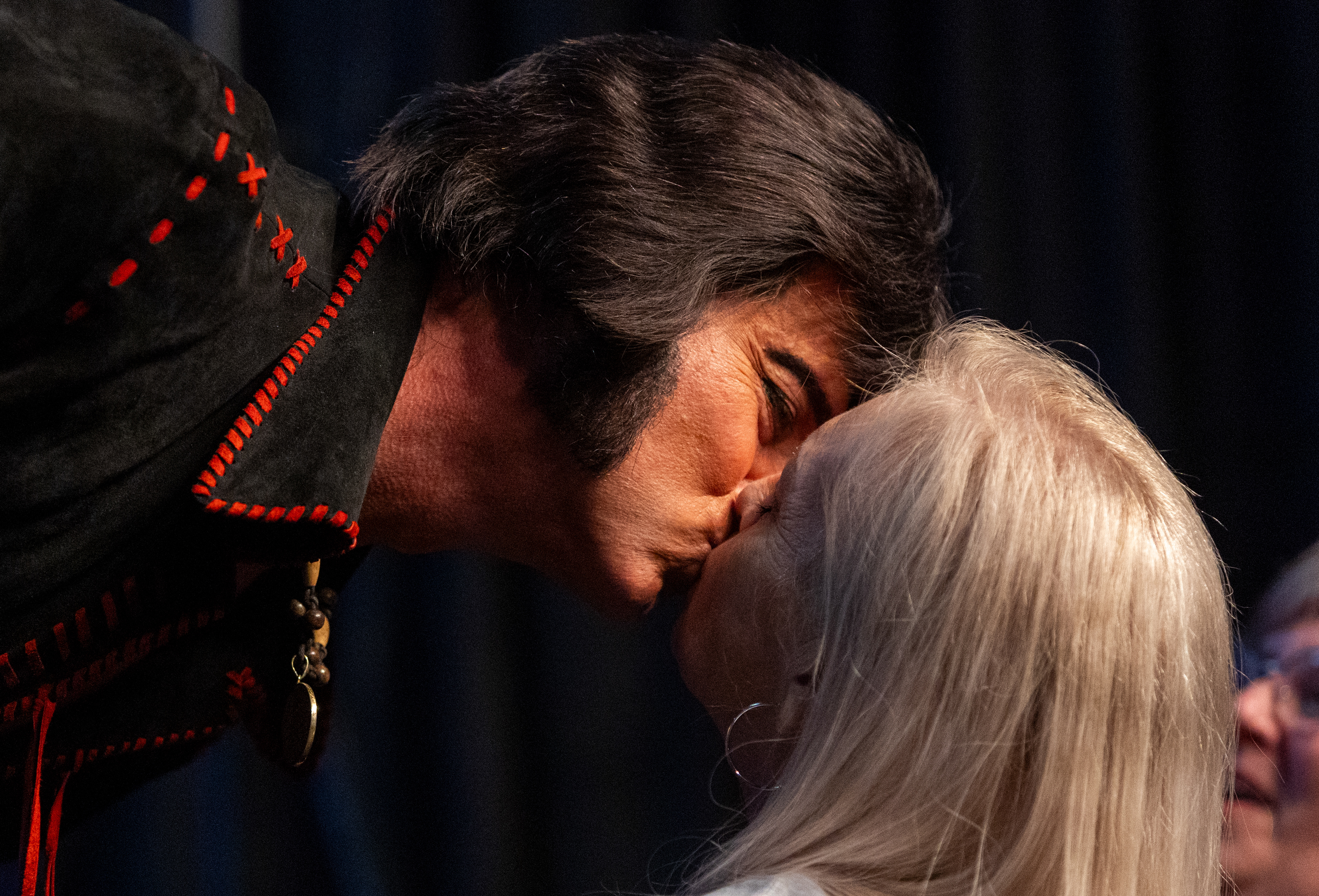 Elvis tribute artist Bill Cherry kisses a fan while performing during the Illinois Elvis Festival at Gateway Convention Center in Collinsville, Ill. on Friday, June 28, 2024. 