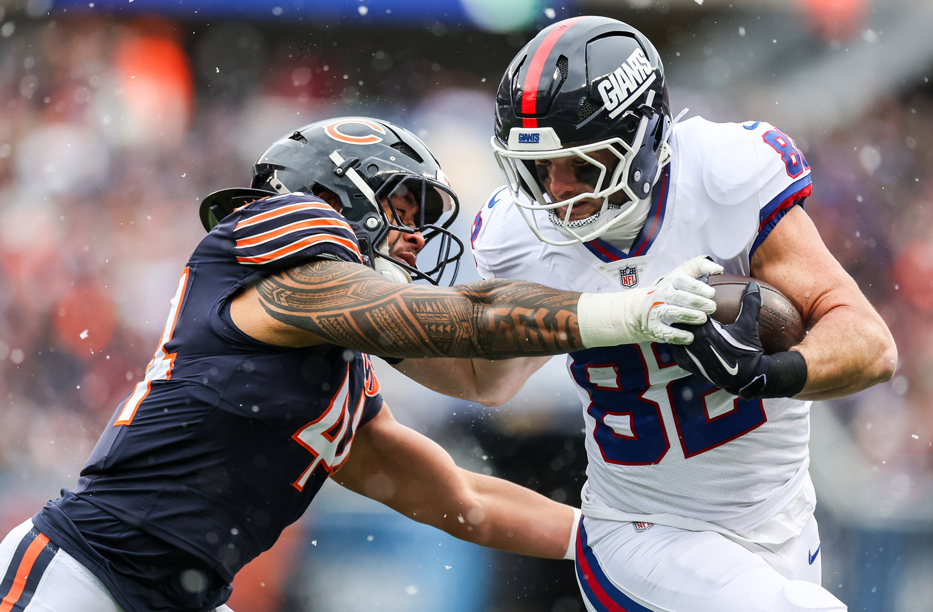 Bears linebacker Noah Sewell (44) takes down Giants tight end Daniel Bellinger (82) before he entered the end zone during the second quarter, Sunday, Nov. 9, 2025, at Soldier Field in Chicago. (Dominic Di Palermo/Chicago Tribune)
