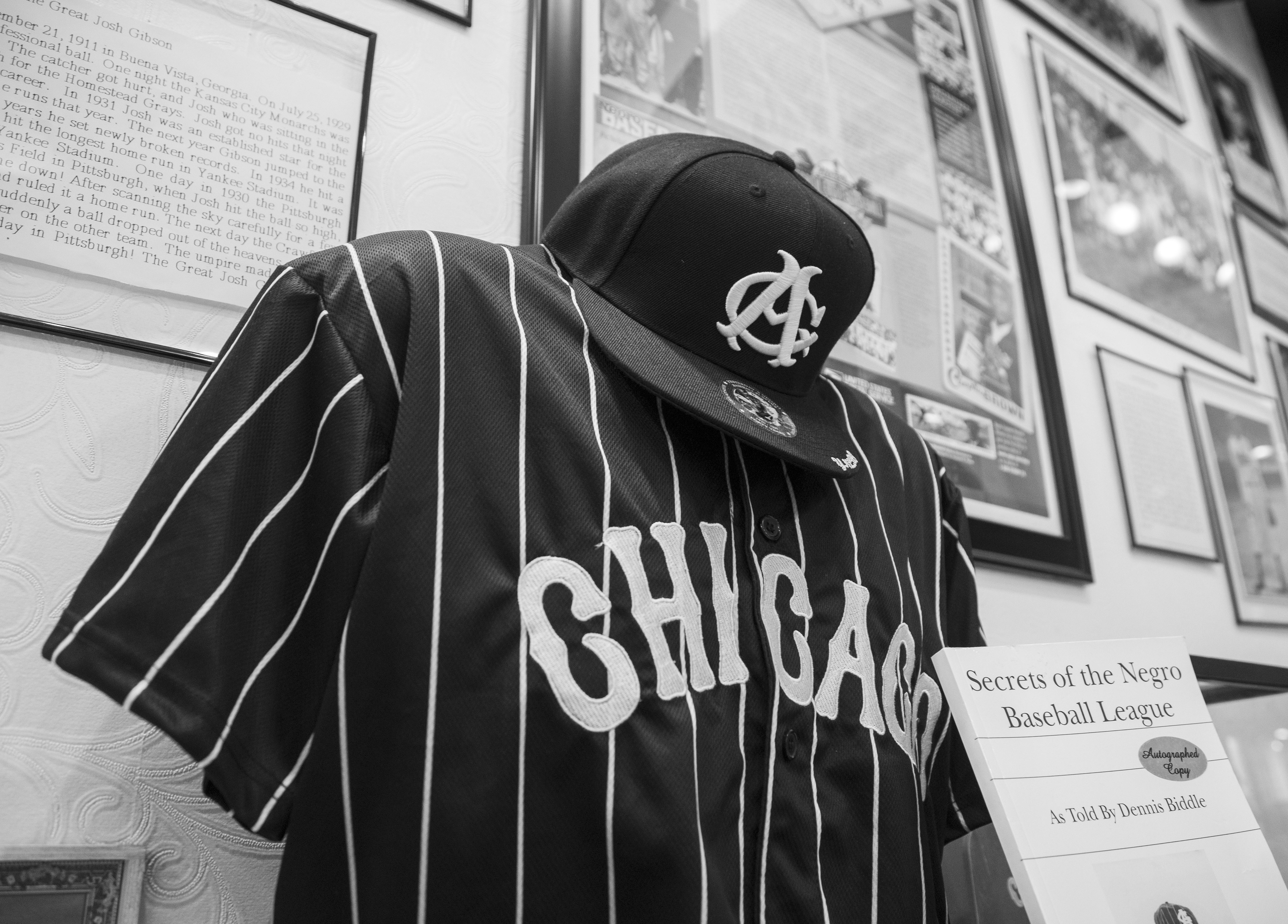 A replica of Biddle's Chicago American Giants hat and jersey on display at his store located in the Mayfair Mall in Wauwatosa, Wisconsin.