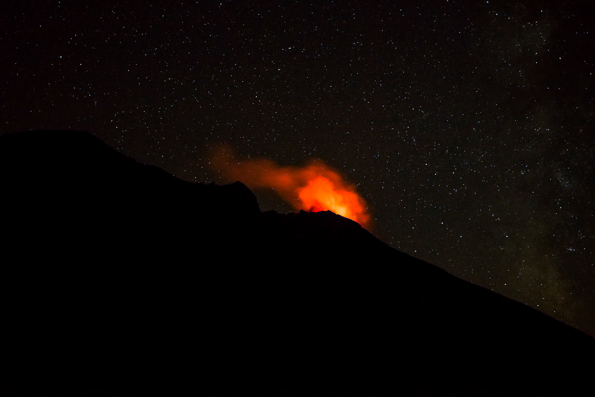The volcano Stromboli during an eruption in the middle of the night.