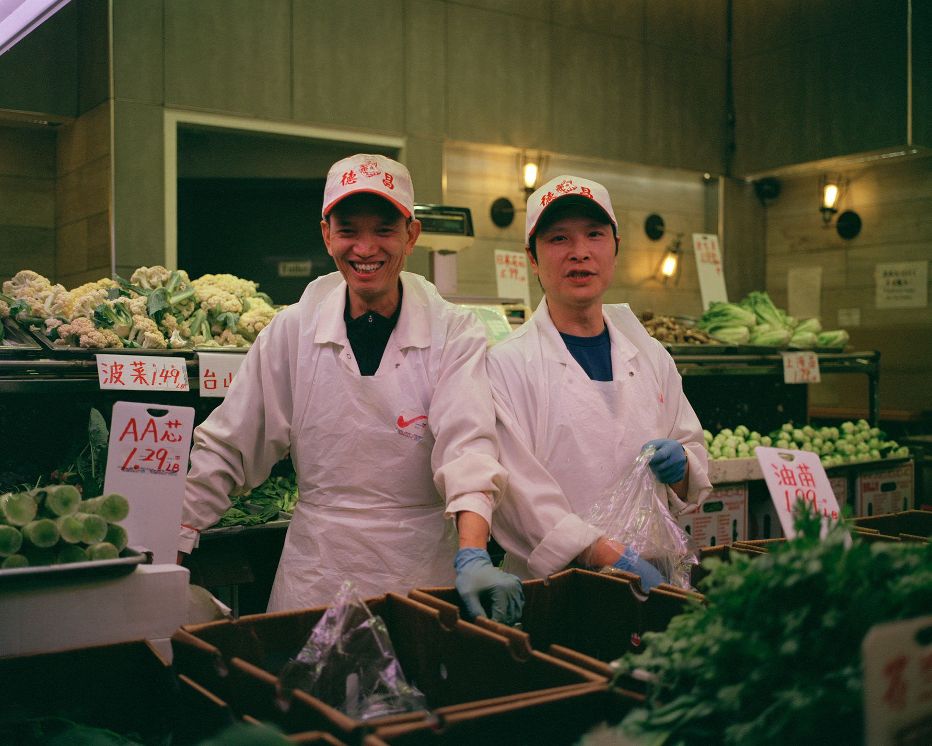 Elizabeth Street // Vegetable Vendors at Deluxe Food Market pose for a photo