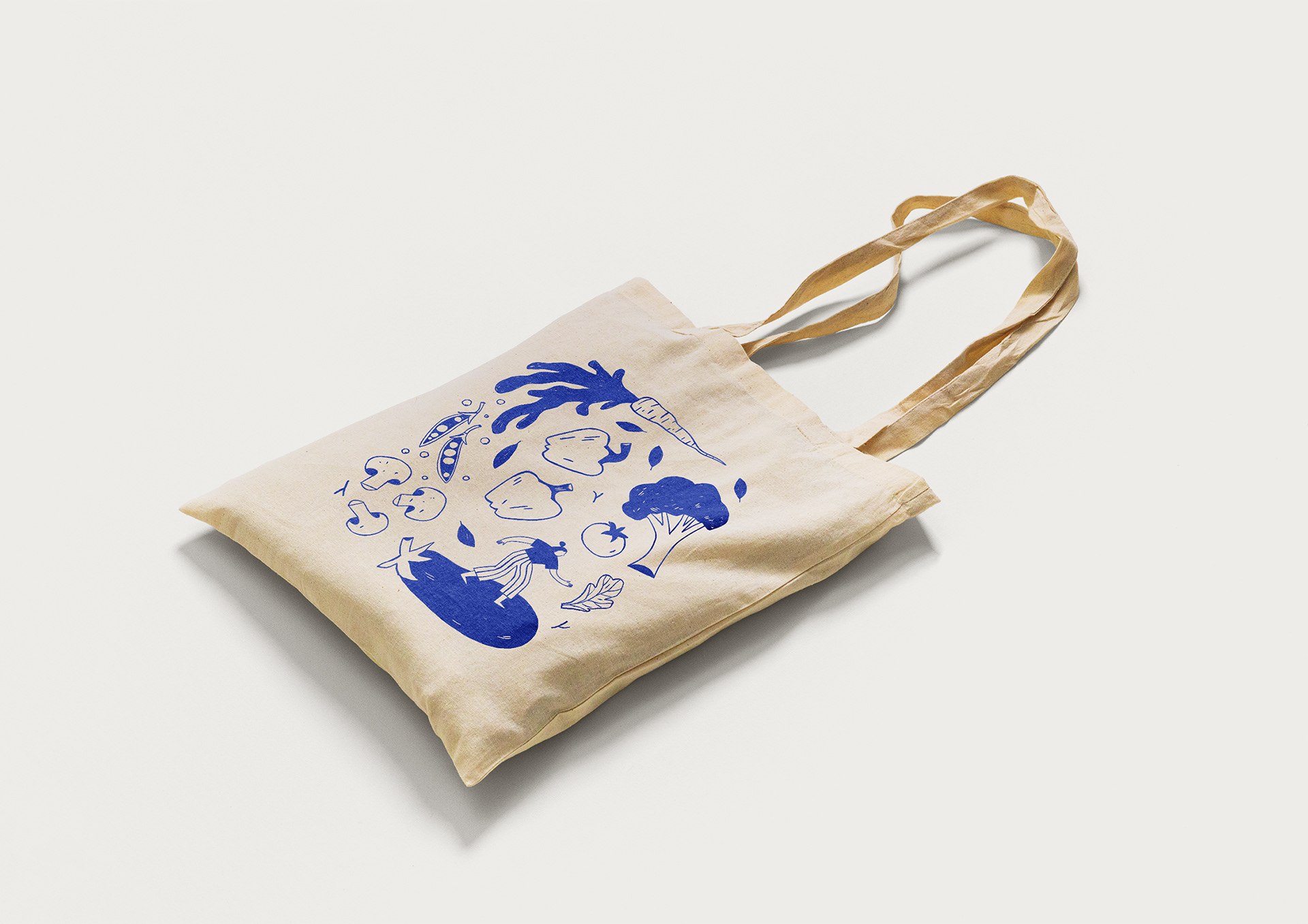 Custom packaging design and line art illustration printed on a tote bag