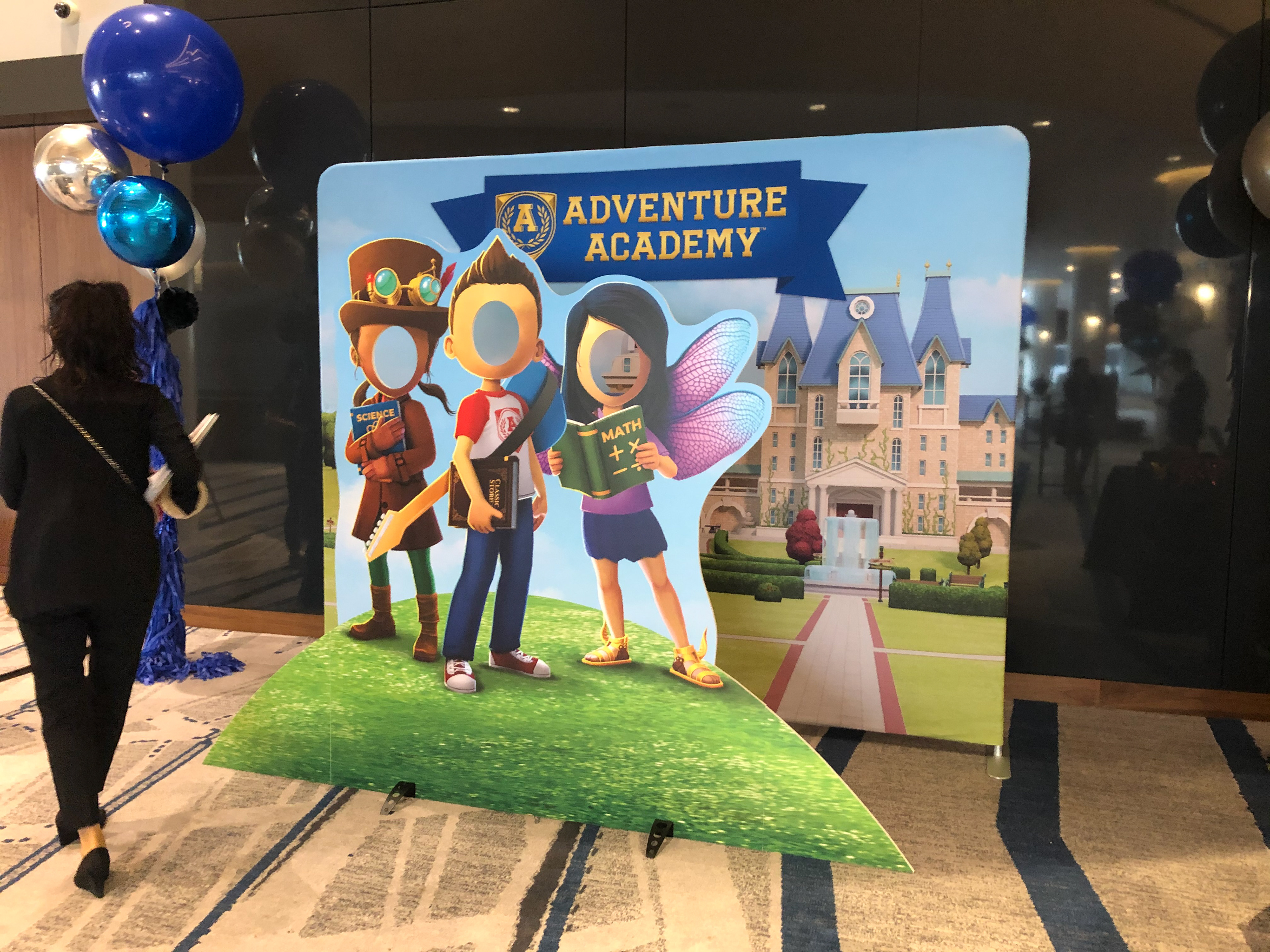 CUT-OUT STANDEE WITH DYE-SUB BACKDROP