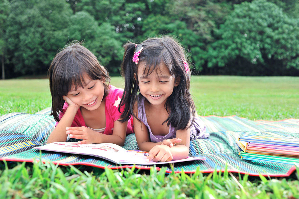 Young and cute best friends studying and do revision together