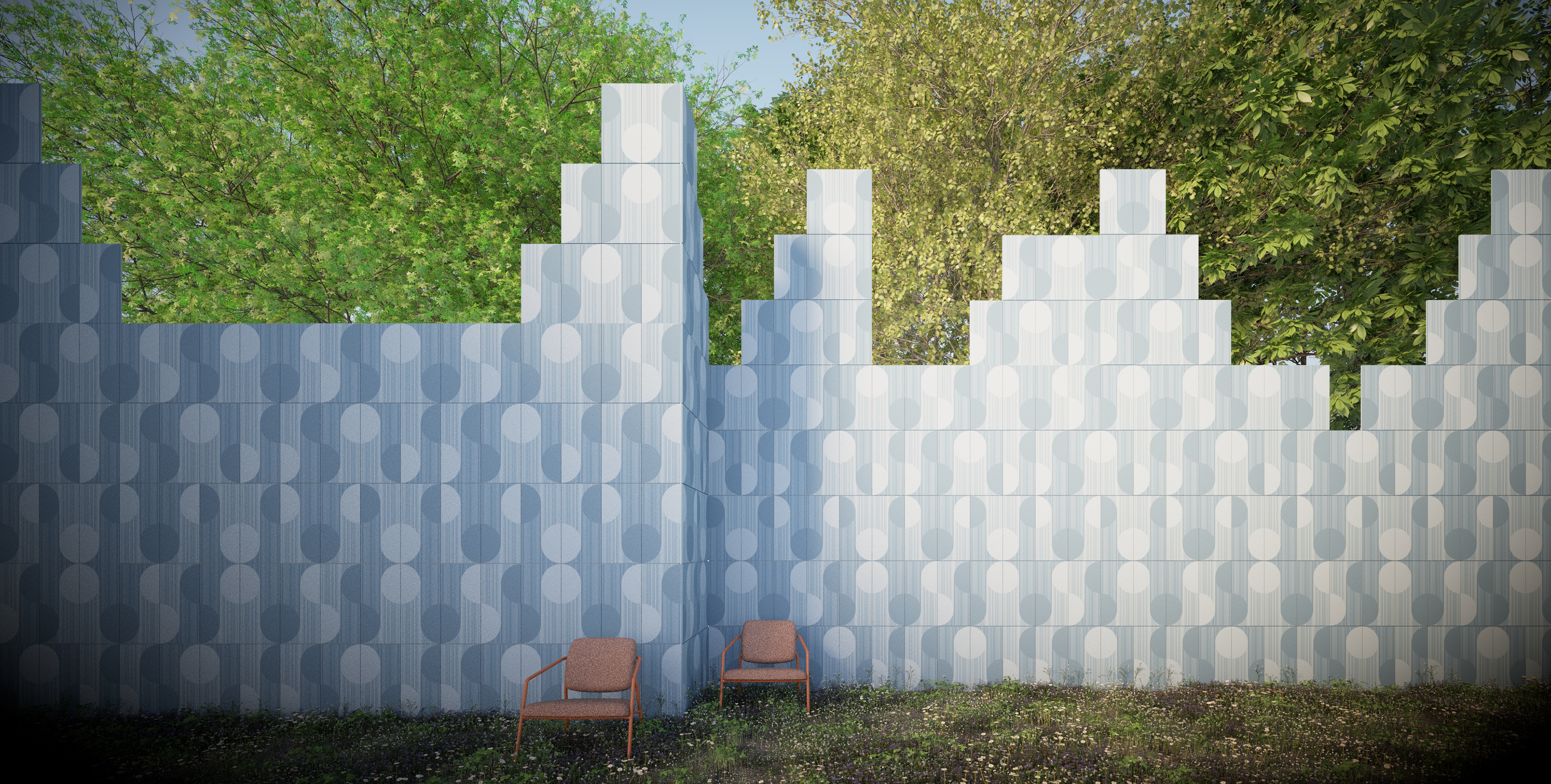 Outdoor installation view of "Transmitter" ceramic tiles, featuring interlocking blue and white patterns arranged in a stepped wall composition.