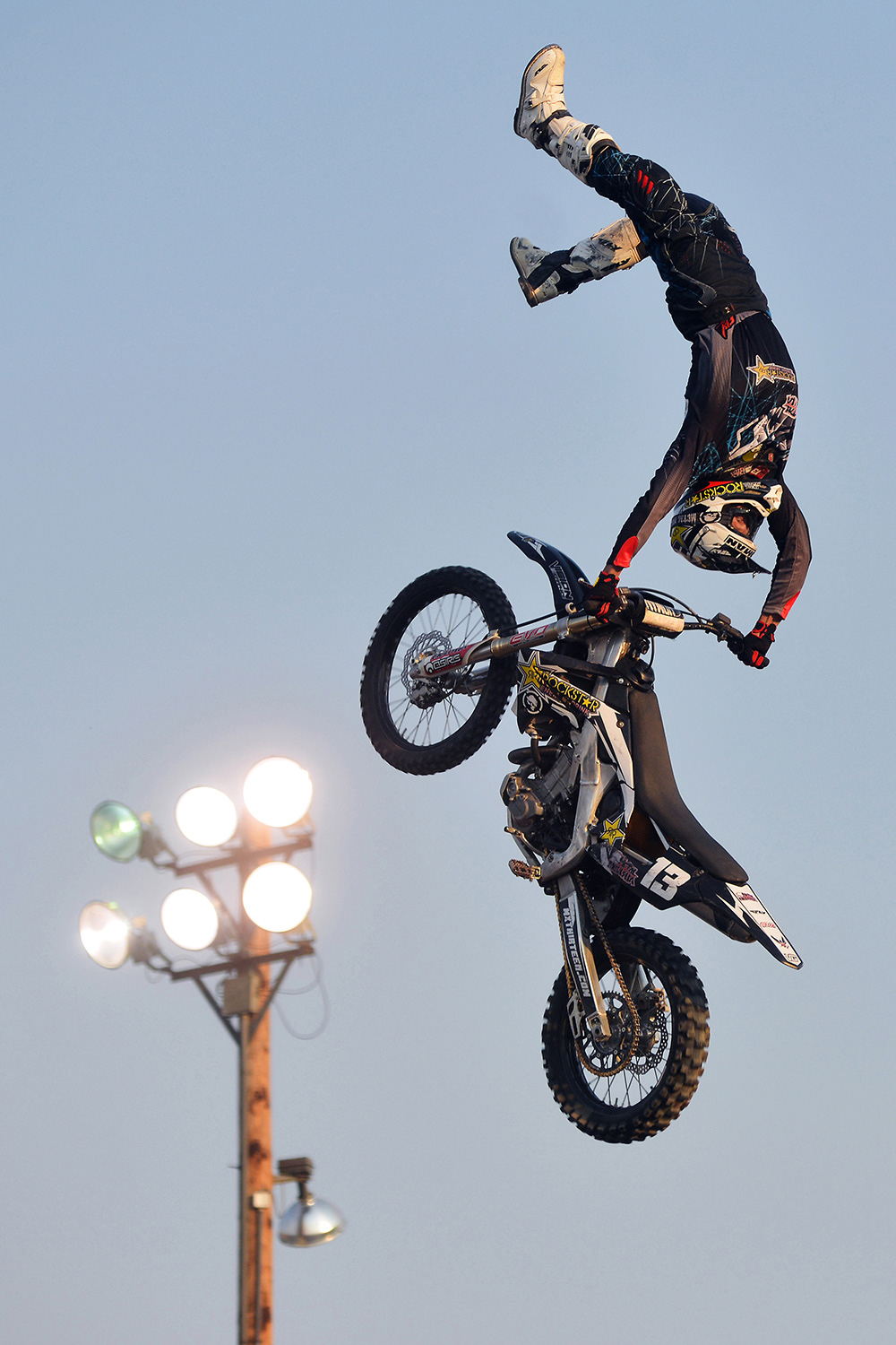 Justin Homan performs with the Metal Mulisha on Wednesday, Aug. 12, 2015, before the start of the Farm-City Pro Rodeo in Hermiston, Oregon.