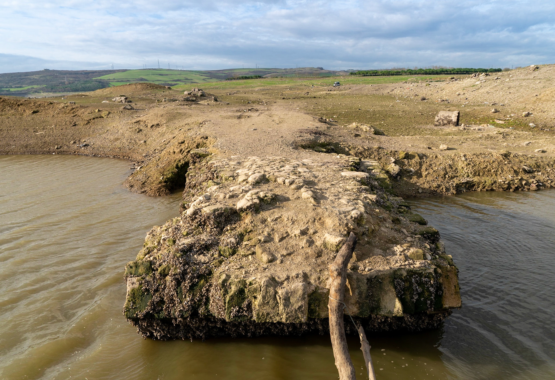 Şamlar: the long-submerged Ottoman bridge in the almost-dry Sazlıdere reservoir bed south of the village