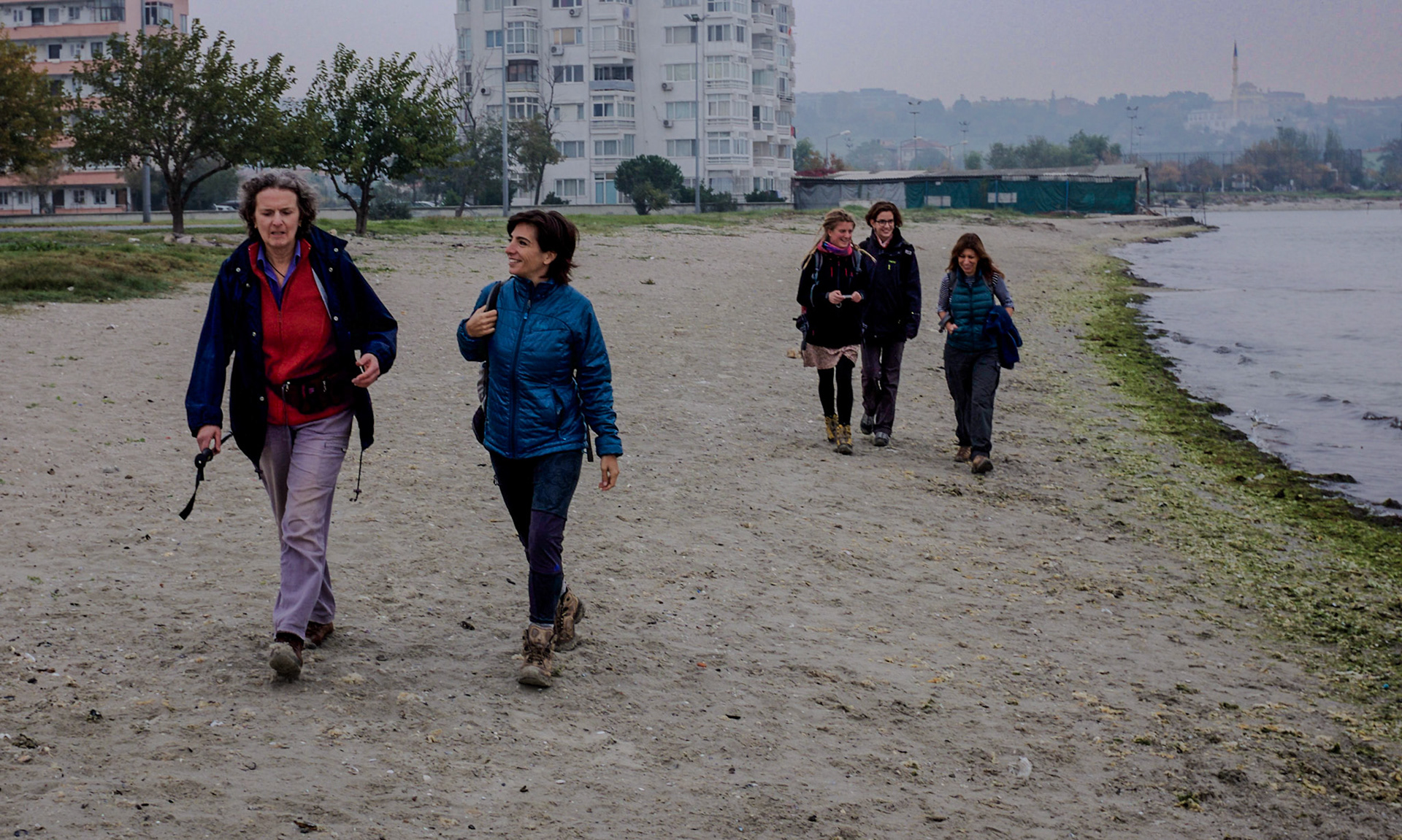 the shore of the Sea of Marmara between Menekşe Plajı and Gümüşpala: Caroline, Aslı, Nilgün and friends walking along the shore (when we started the project it was just us and a few friends)