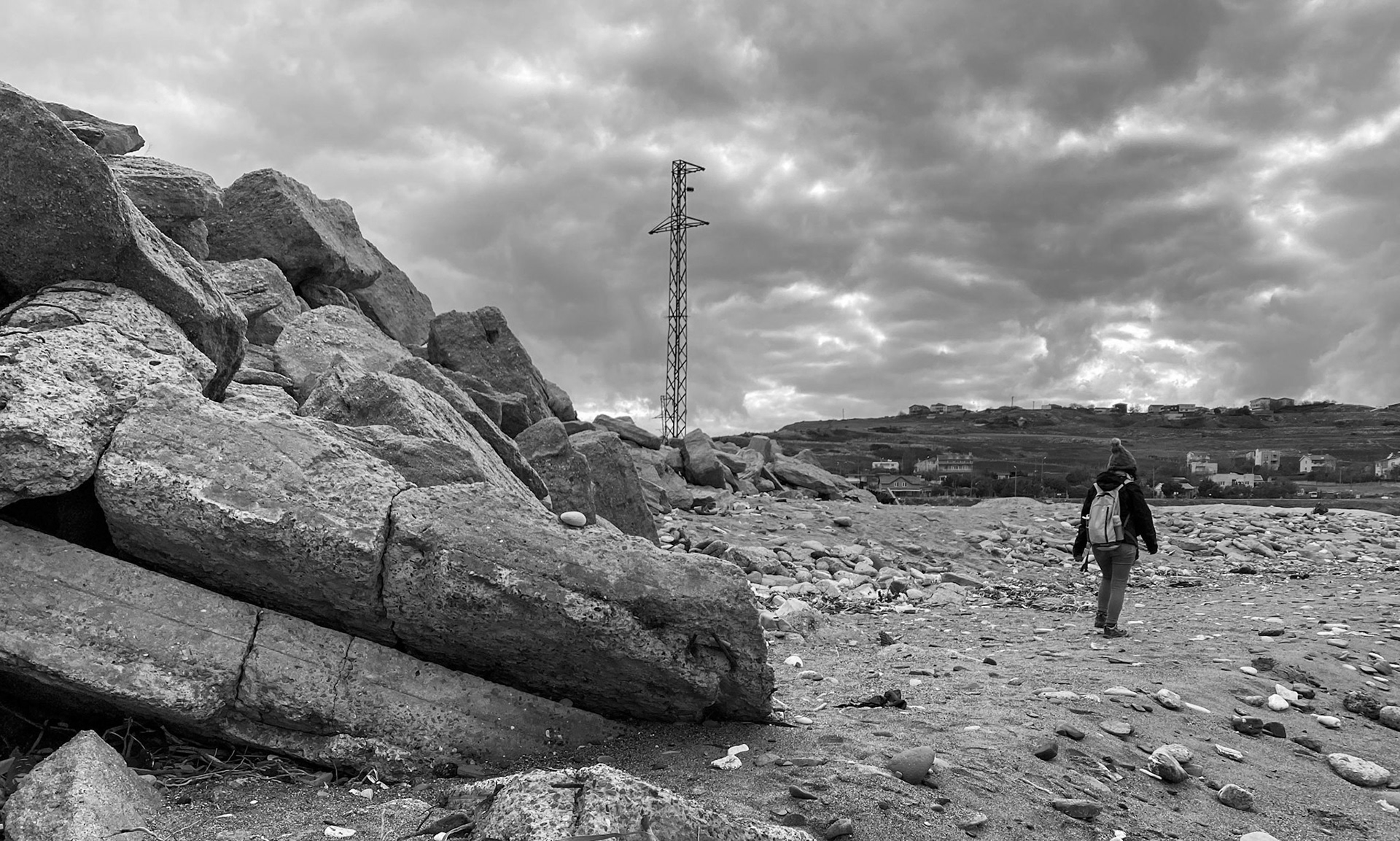 leaving Yeniköy's active mine: Tuǧba on stony beach