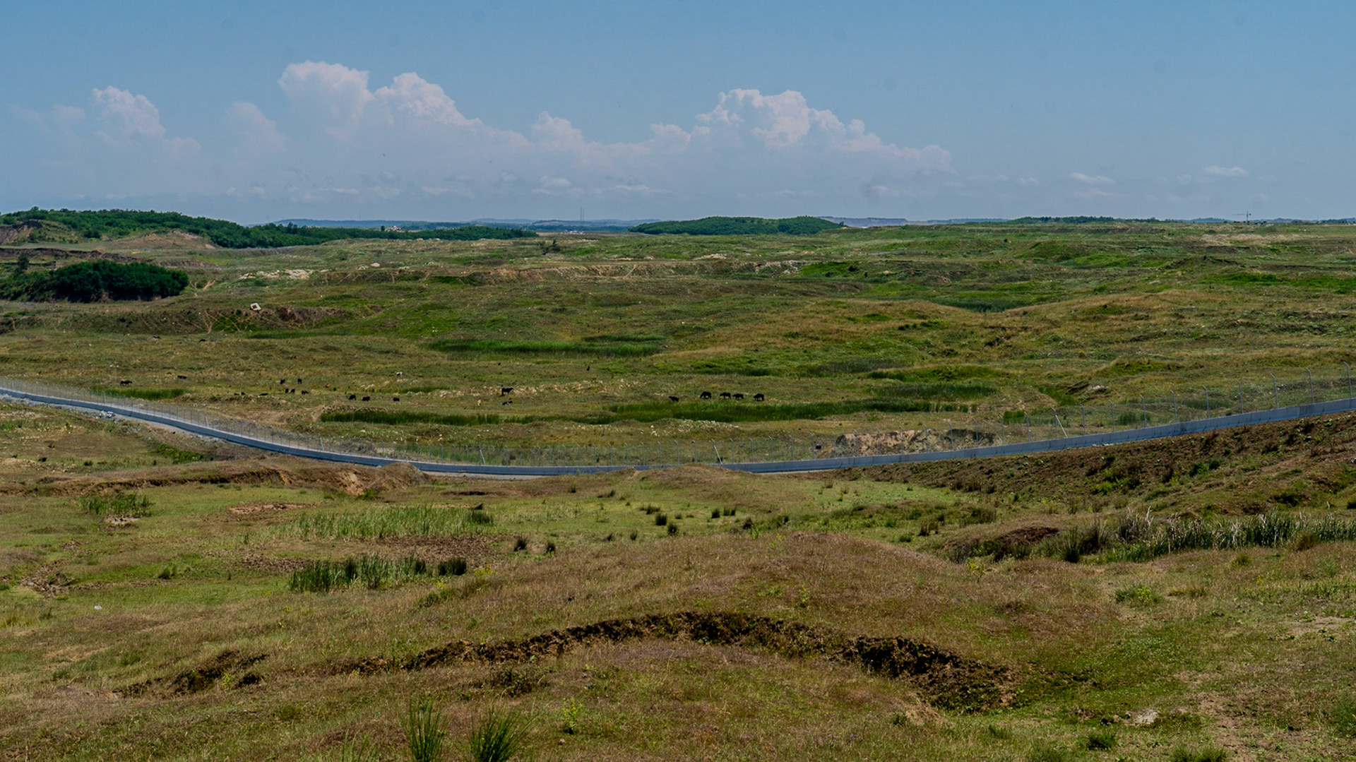 the long-abandoned Yeniköy opencast lignite mines: looking north-east over the airport perimeter fence