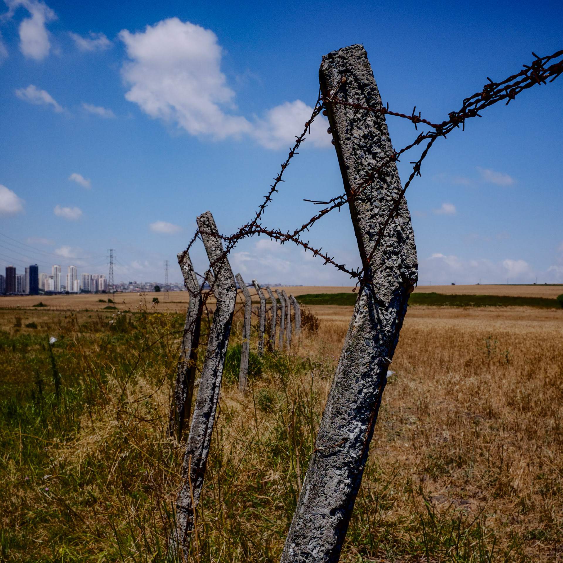between Istanbul University's veterinary farm and the agricultural faculty: broken fence between the farm and the canalised Hadımdere