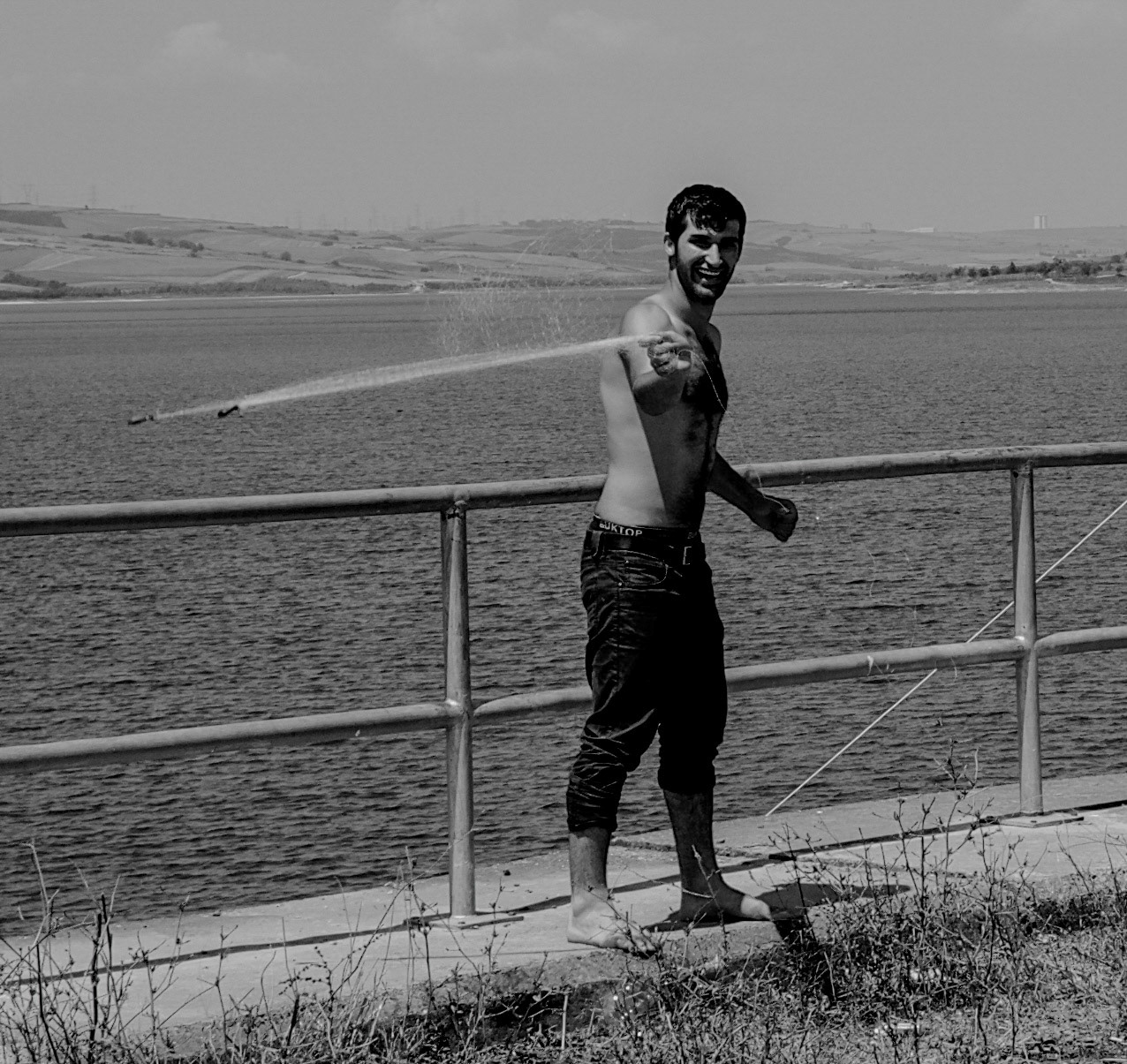 Sazlıdere dam: a happy fisherman close to the dam
