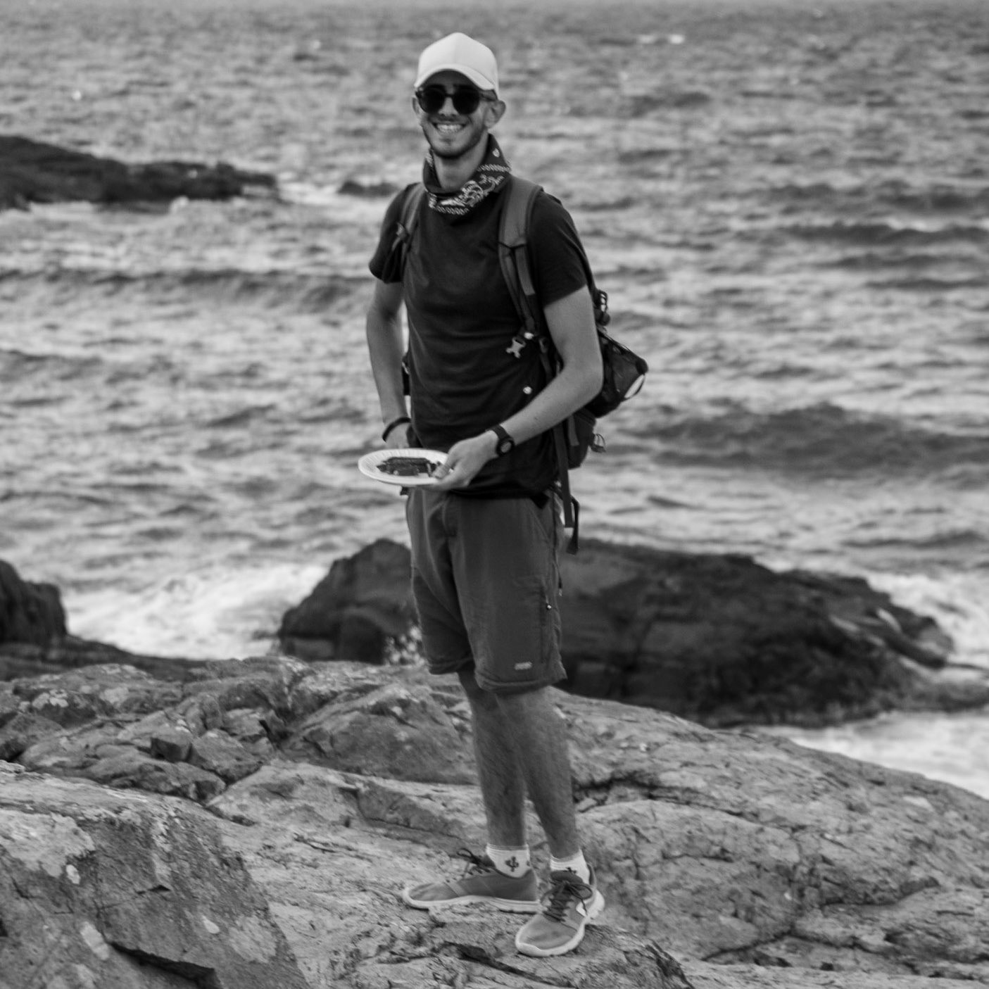 between the English Houses and Riva: happy, sporty hiker with dolma