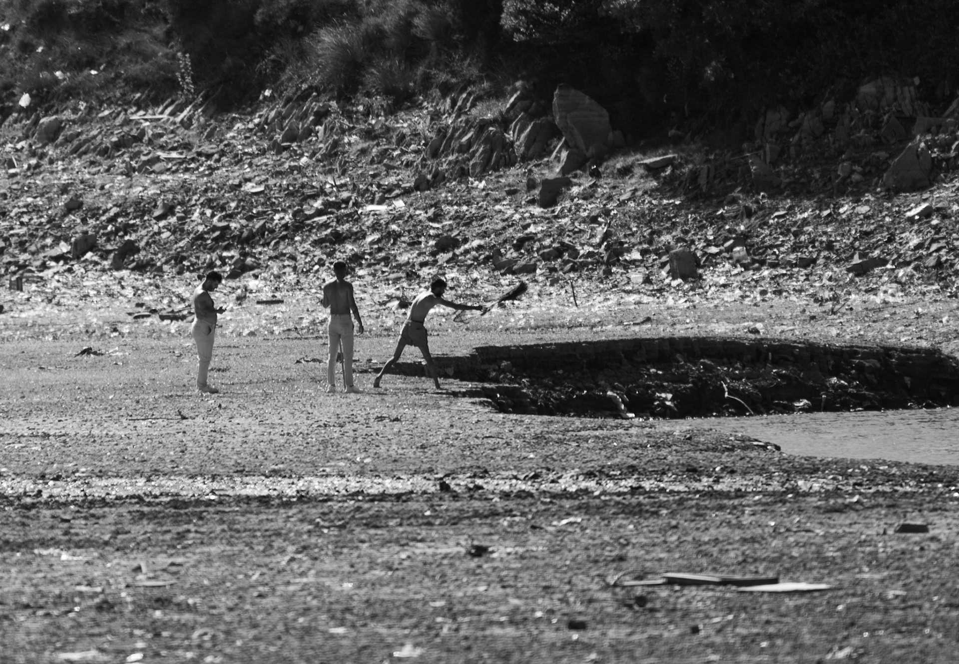 Paşaköy gorge: three young men fishing